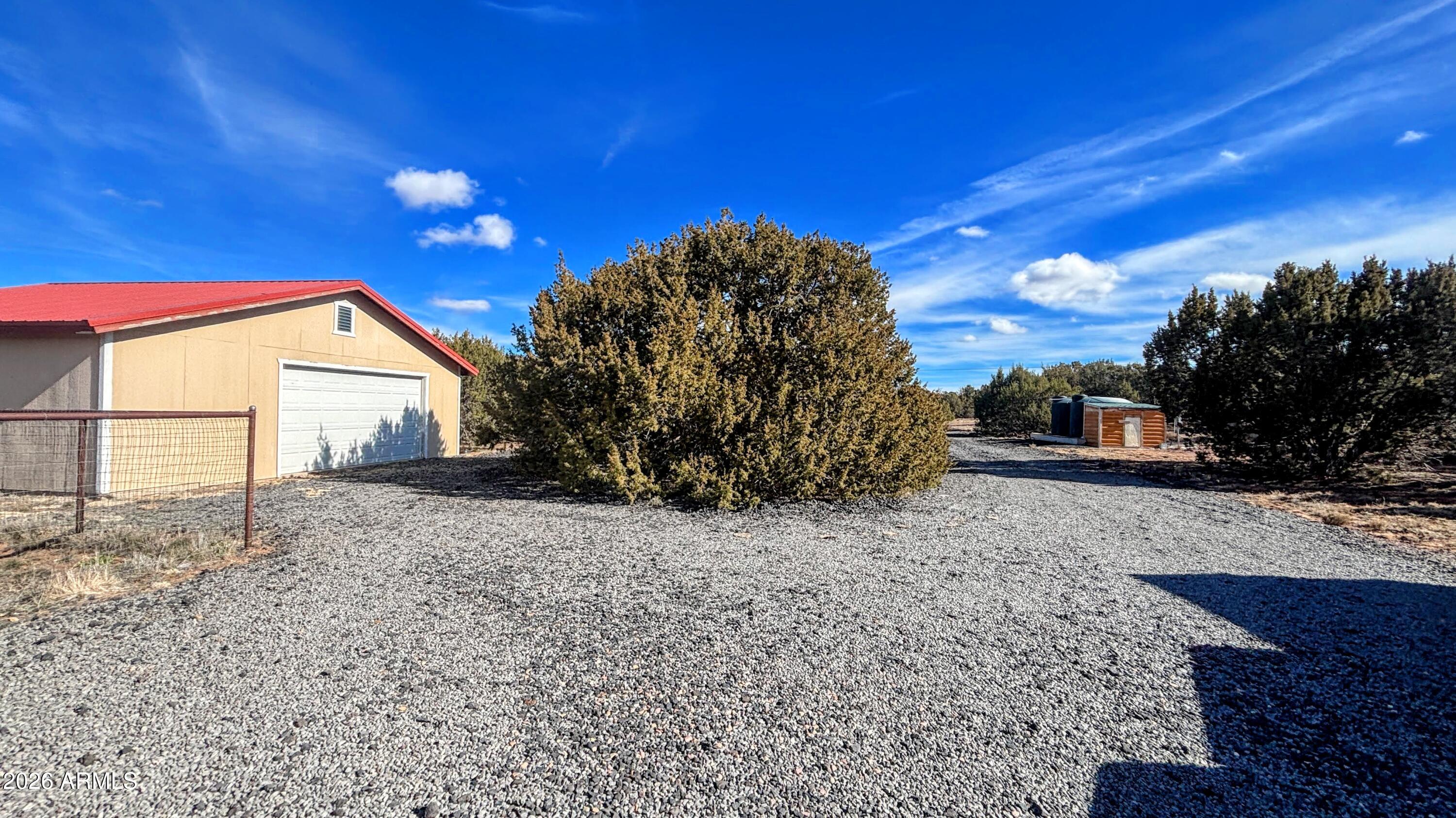 111 County Road, Unit 8015 Show Low, AZ 85901 - Photo 32 of 34 a house view with a backyard space