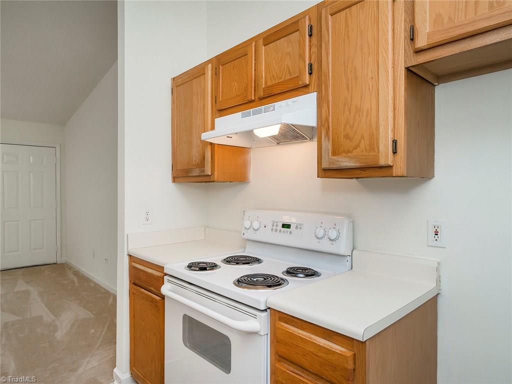 3621 Country Ridge Road Greensboro, NC 27405 - Photo 14 of 24 Kitchen with great storage!