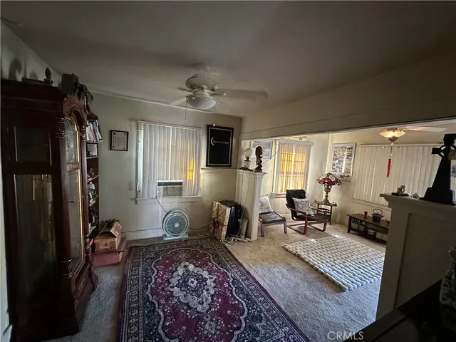 a bed room with furniture and a window