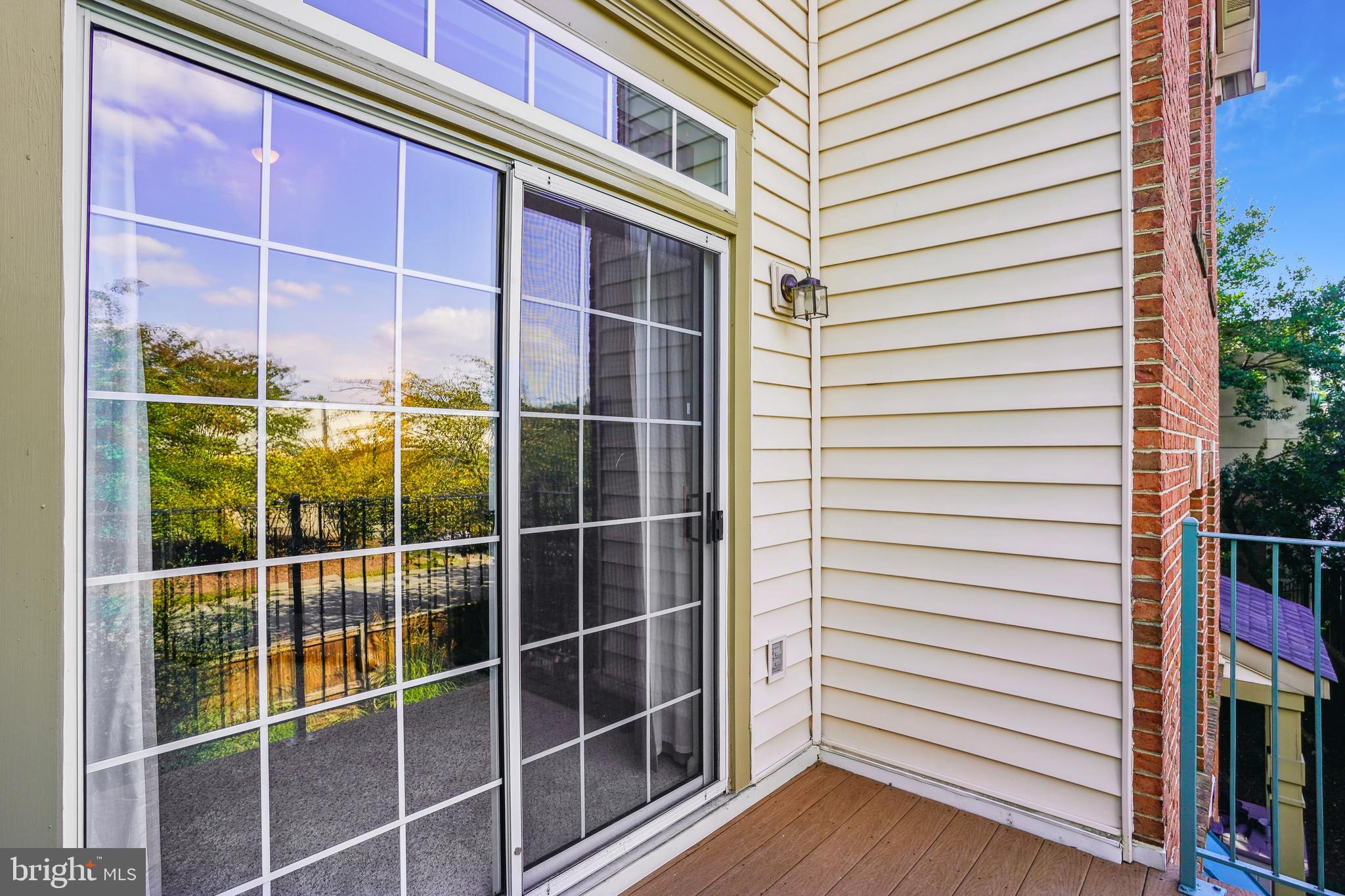 11882 Breton Court, Unit 10B Reston, VA 20191 - Photo 7 of 46 Balcony off of Living Room