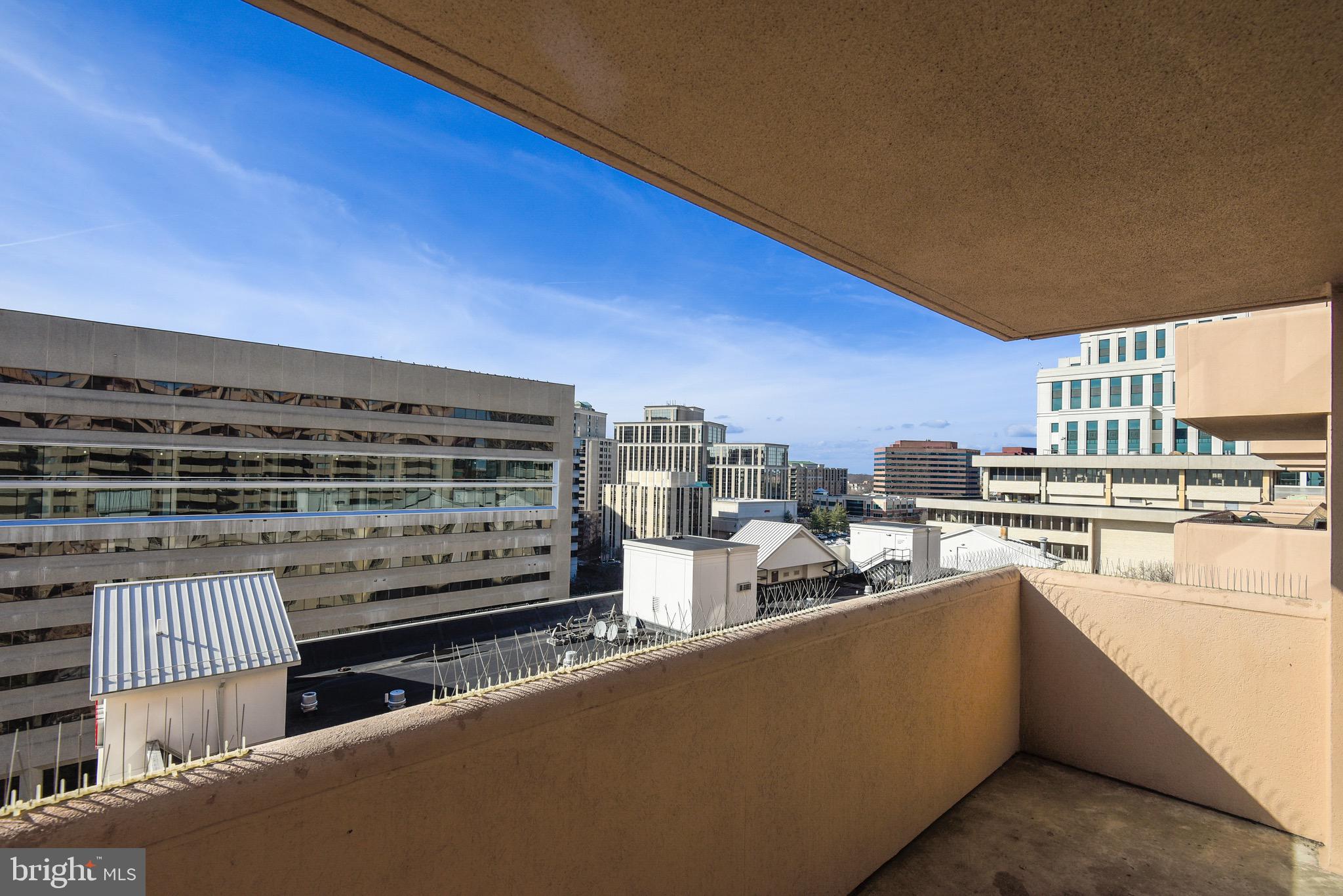 1301 North Courthouse Road, Unit 1503 Arlington, VA 22201 - Photo 16 of 26 a view of a city from a balcony