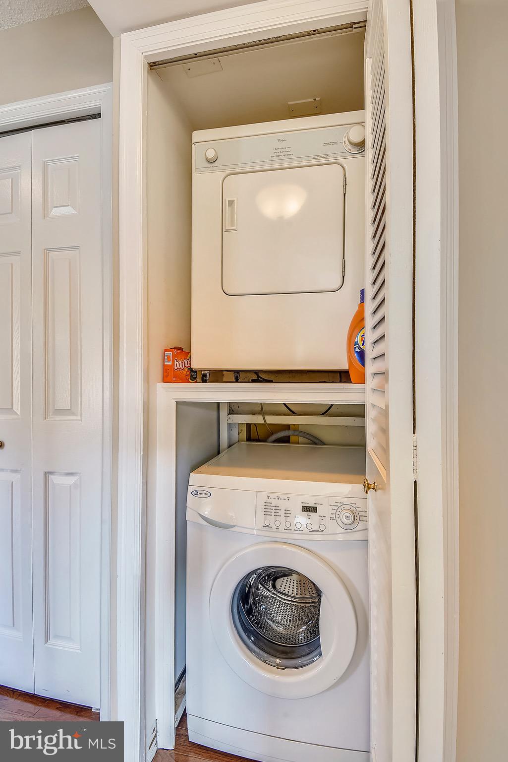 1301 North Courthouse Road, Unit 1503 Arlington, VA 22201 - Photo 17 of 26 a utility room with dryer and washer