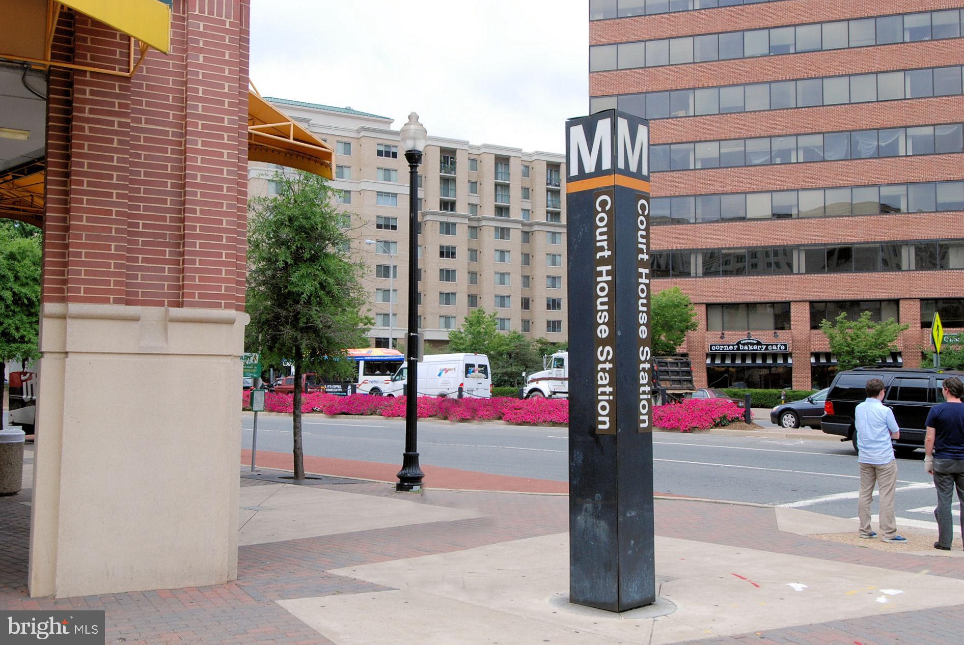 1301 North Courthouse Road, Unit 1503 Arlington, VA 22201 - Photo 23 of 26 a front view of a building with sign board