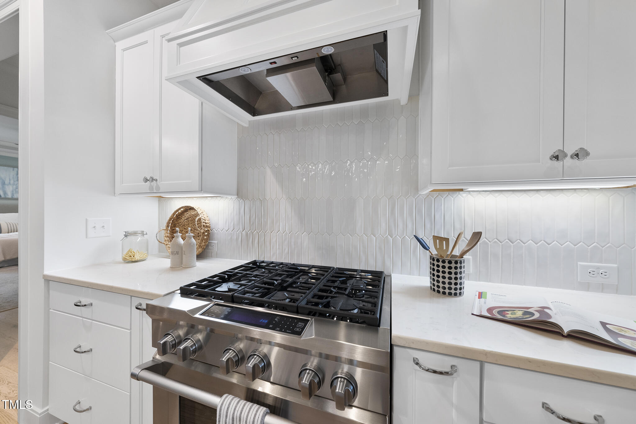 2073 Amalfi Place Apex, NC 27502 - Photo 11 of 40 a white stove top oven sitting inside of a kitchen
