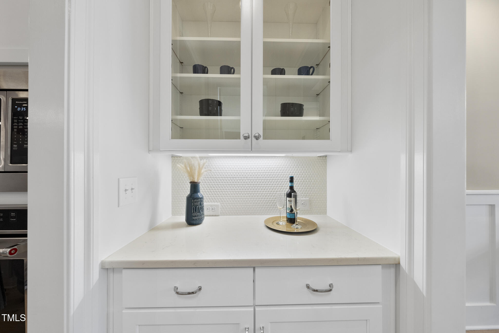 2073 Amalfi Place Apex, NC 27502 - Photo 15 of 40 a kitchen with a sink and cabinets