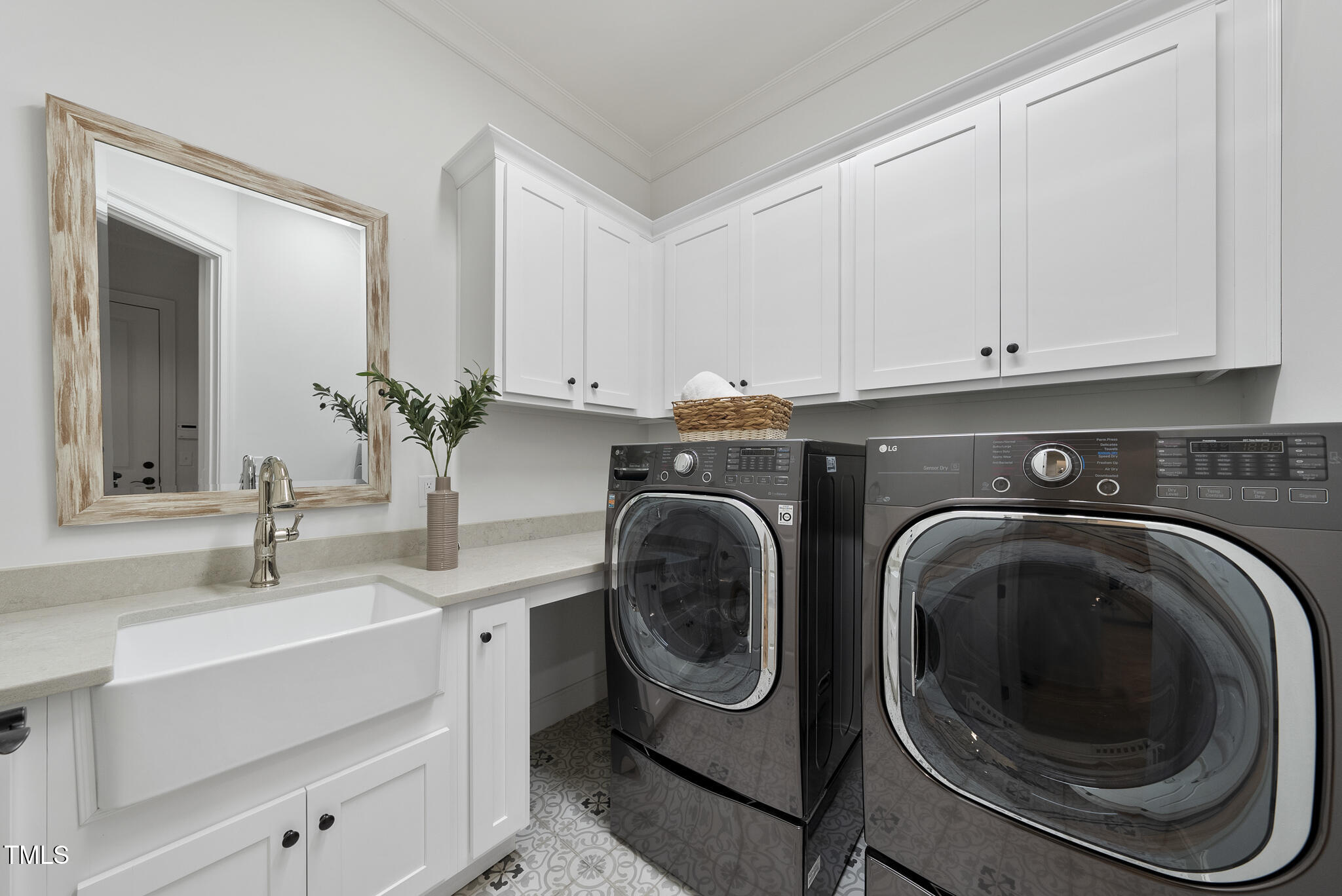 2073 Amalfi Place Apex, NC 27502 - Photo 17 of 40 a utility room with sink dryer and washer