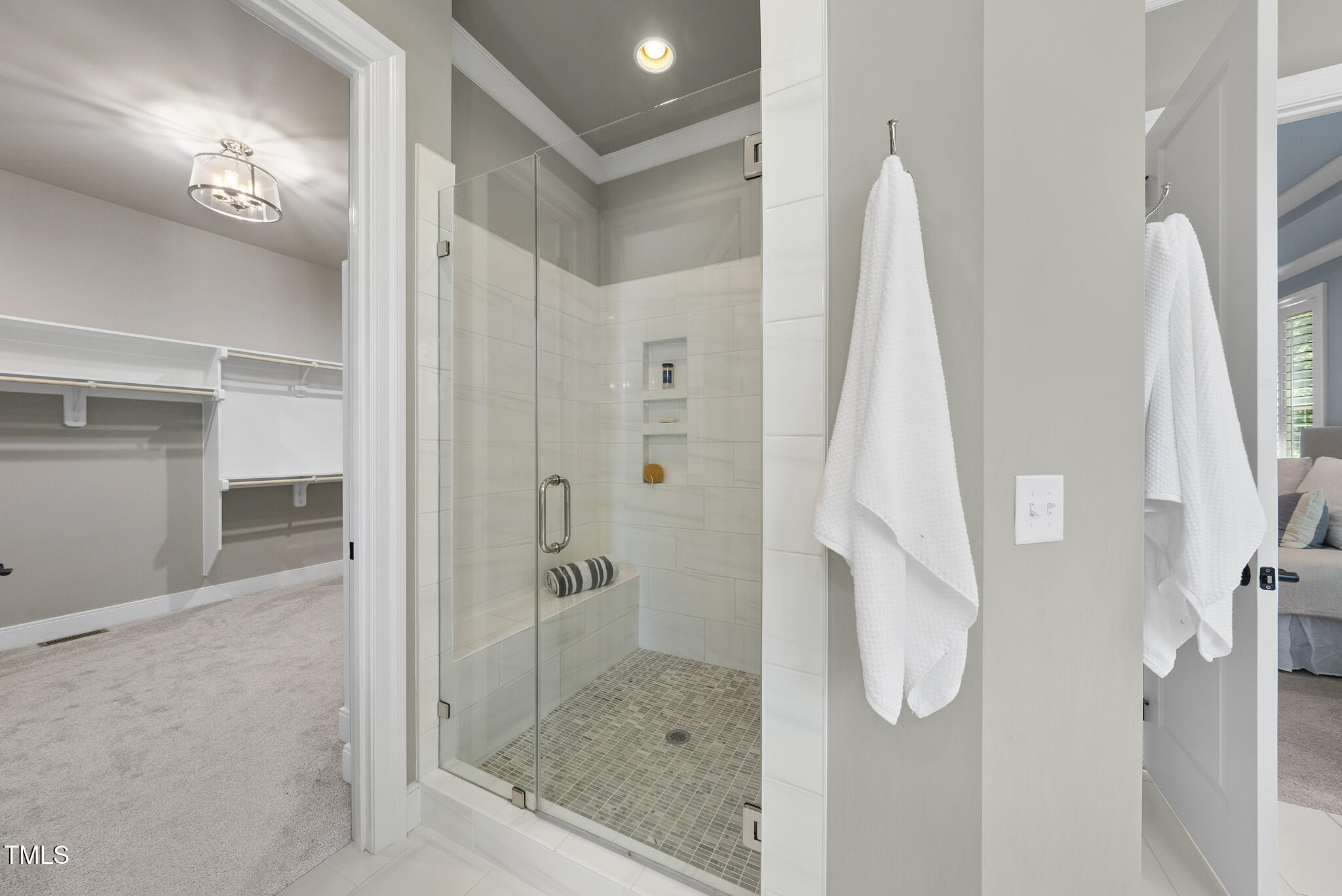 2073 Amalfi Place Apex, NC 27502 - Photo 23 of 40 a bathroom with a shower and a sink