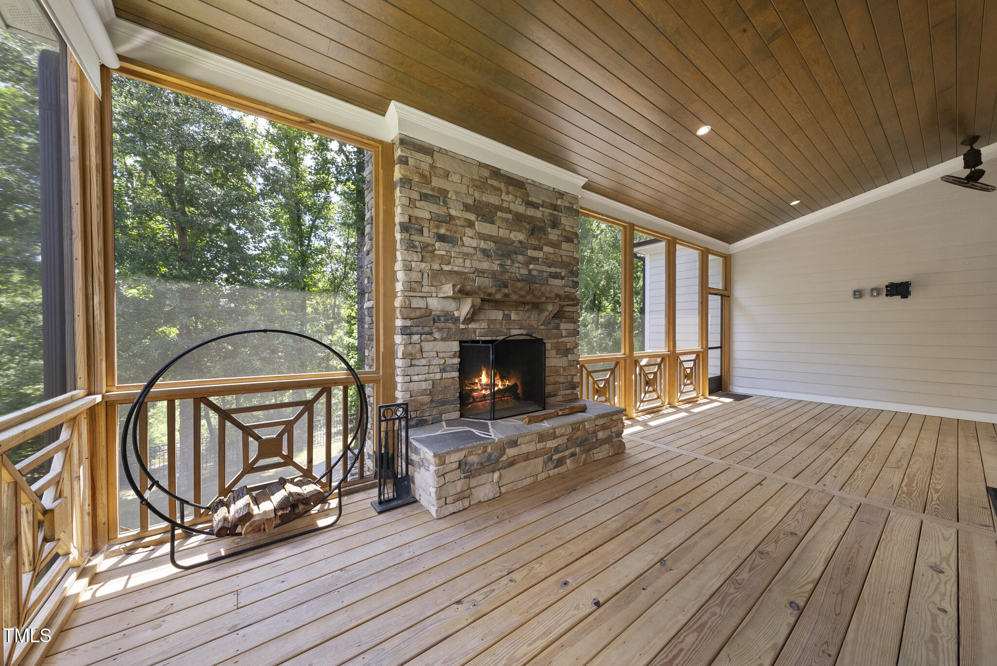 2073 Amalfi Place Apex, NC 27502 - Photo 25 of 40 a view of an entryway with wooden floor door and windows