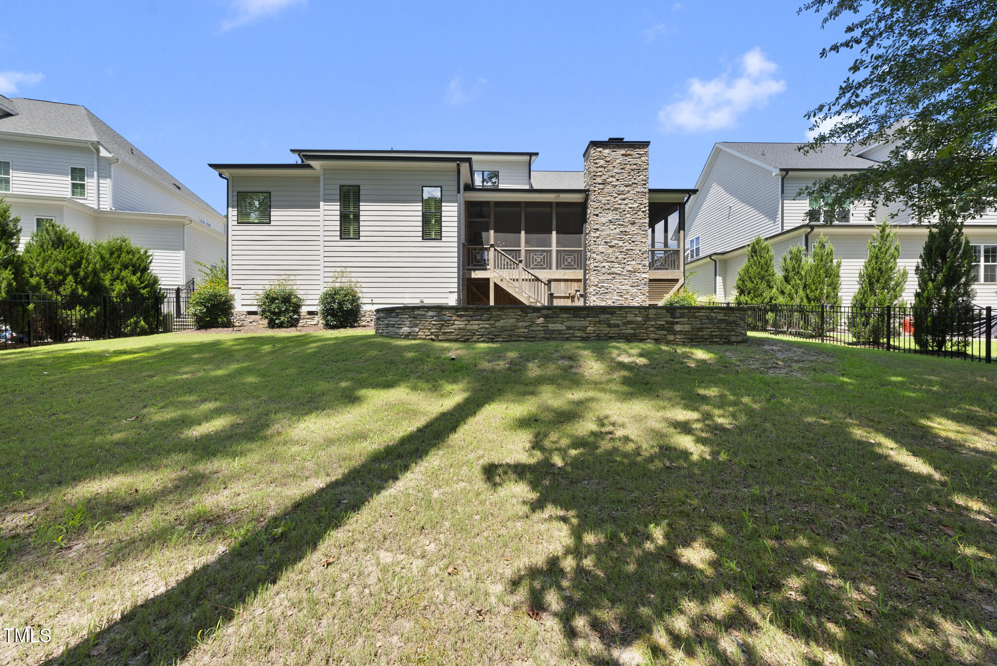 2073 Amalfi Place Apex, NC 27502 - Photo 28 of 40 a view of a house with a yard