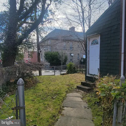 a view of a yard with an outdoor space