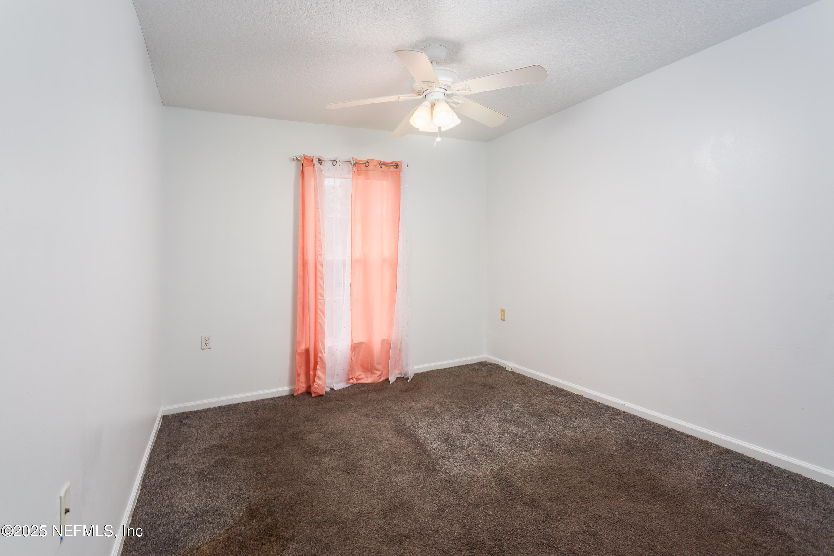 164 Carole Road Palatka, FL 32177 - Photo 16 of 32 an empty room with a window