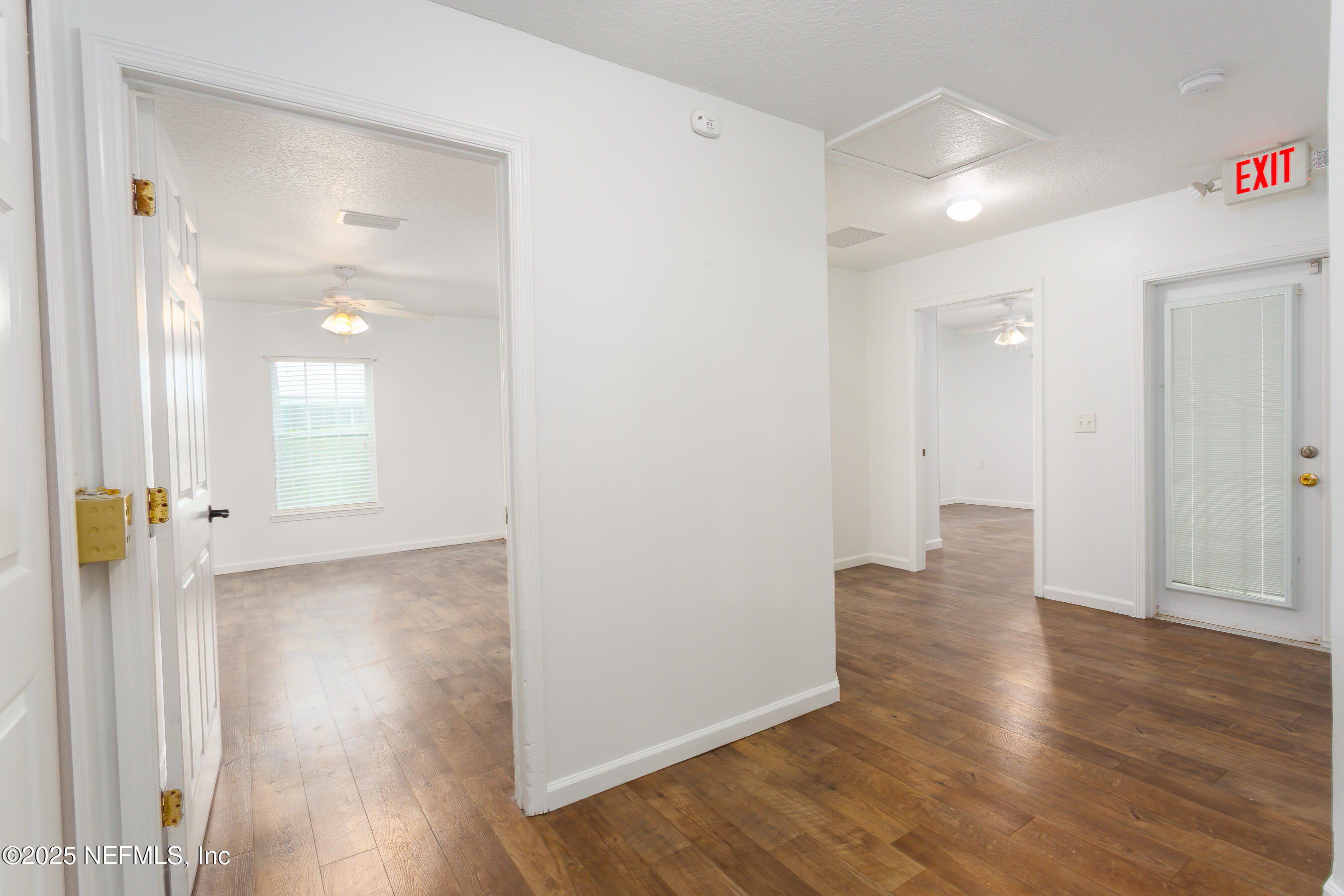 164 Carole Road Palatka, FL 32177 - Photo 17 of 32 a view of a hallway with wooden floor