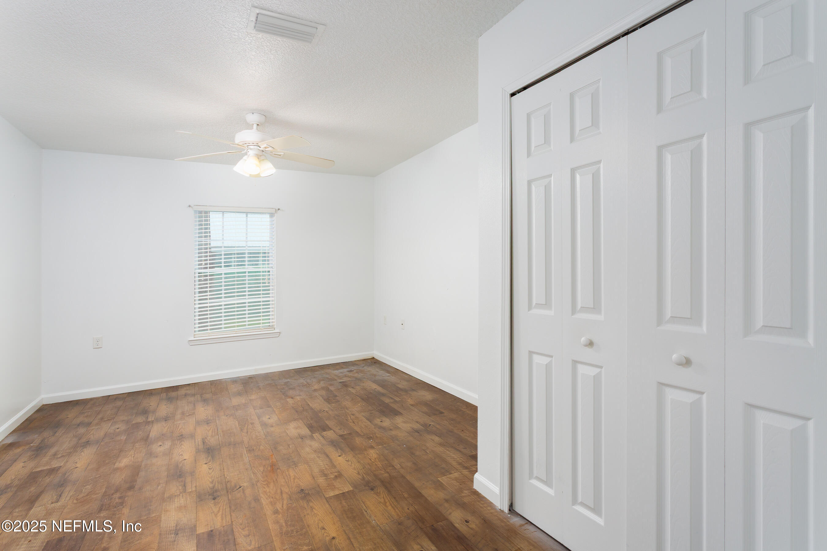 164 Carole Road Palatka, FL 32177 - Photo 18 of 32 a view of an empty room with a window