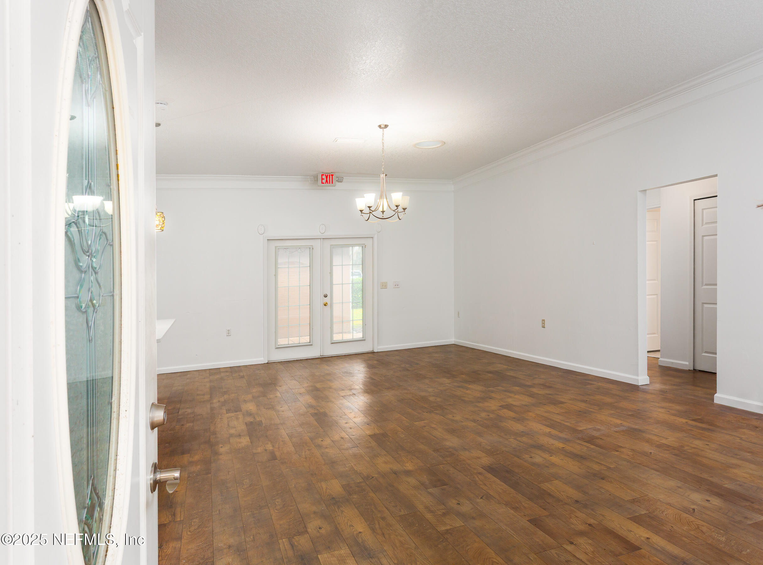 164 Carole Road Palatka, FL 32177 - Photo 3 of 32 a view of empty room with wooden floor