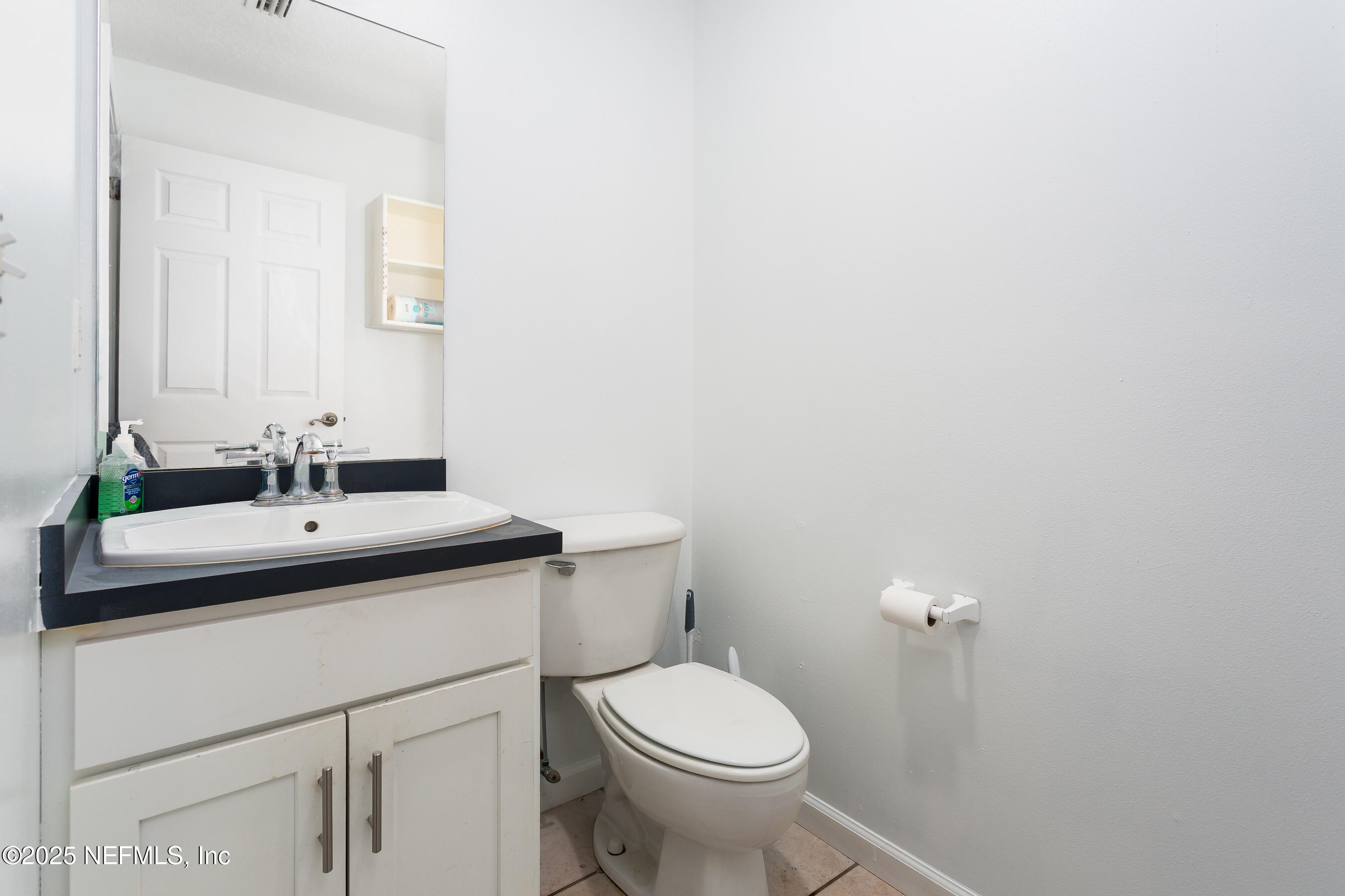 164 Carole Road Palatka, FL 32177 - Photo 10 of 32 a bathroom with a sink toilet and a mirror