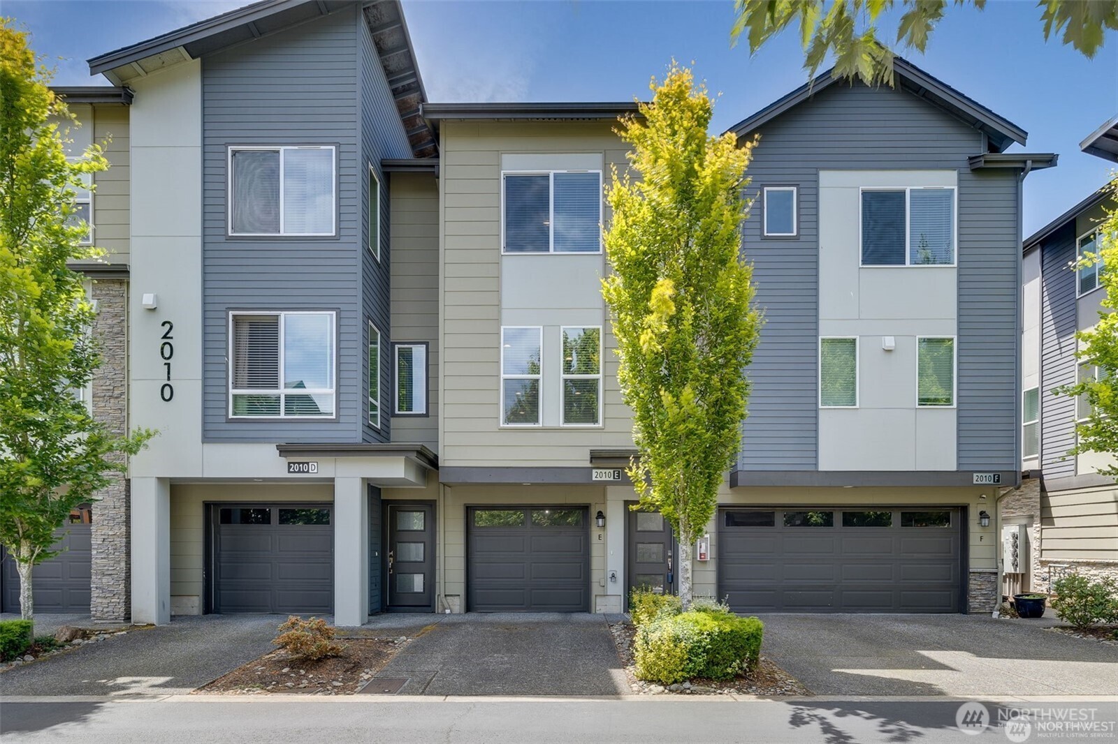 2010 129th Place Southwest, Unit E Everett, WA 98204 - Photo 1 of 37 a front view of a house