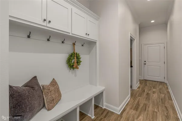 a room with furniture and wooden floor