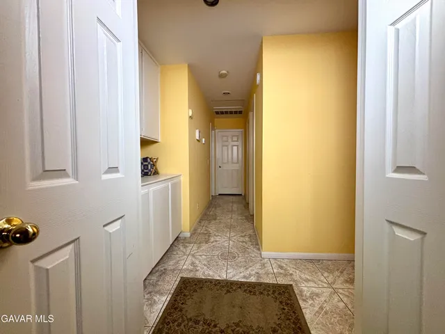 a hallway with a stove