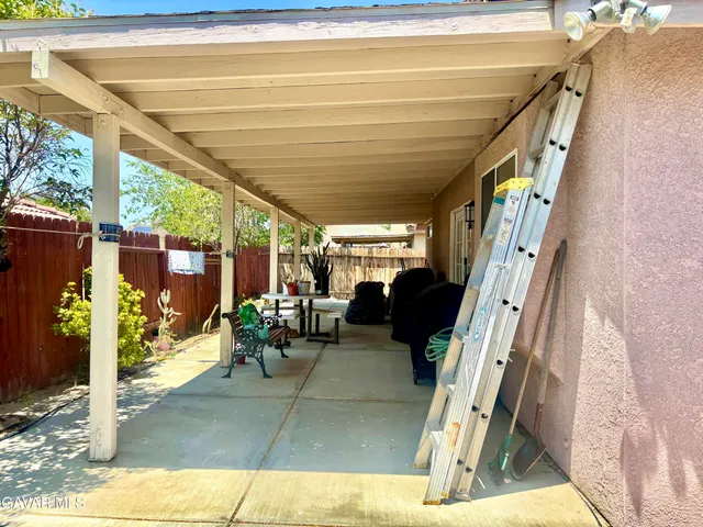 a view of living room filled with furniture