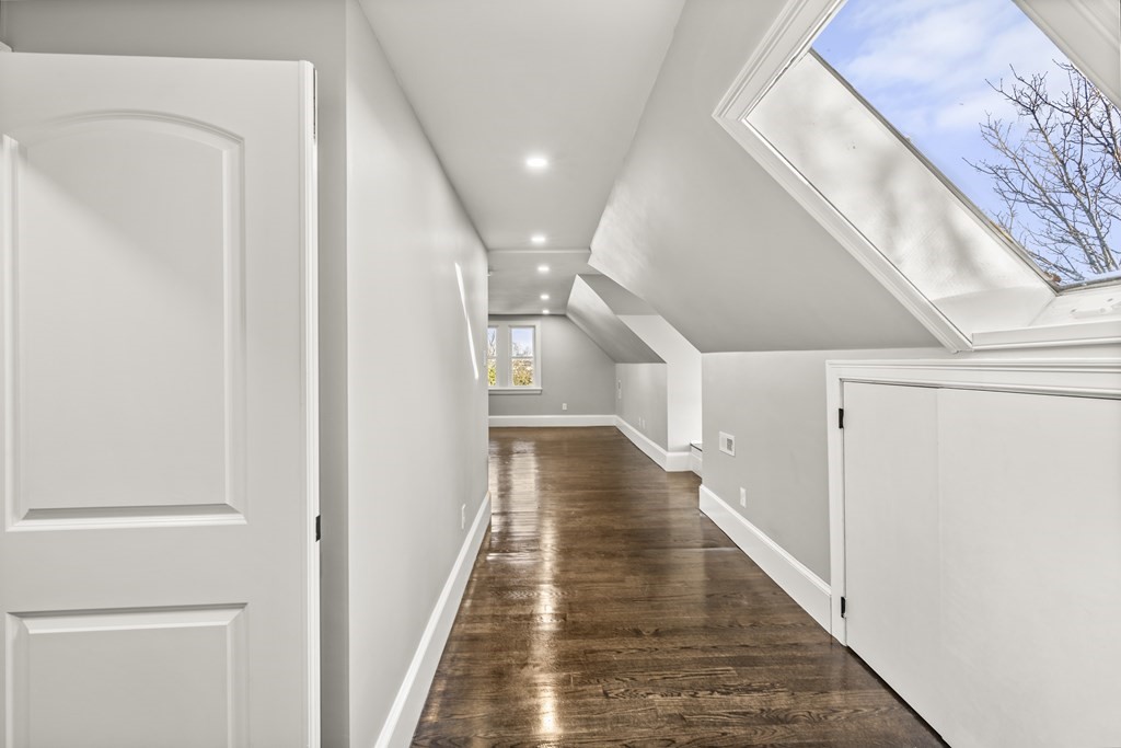 1 Claymont Terrace Boston, MA 02122 - Photo 37 of 42 a view of a hallway with the wooden floor