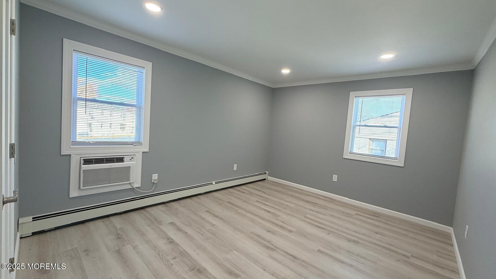 420 Cross Road, Unit B16 Matawan, NJ 07747 - Photo 18 of 29 an empty room with windows