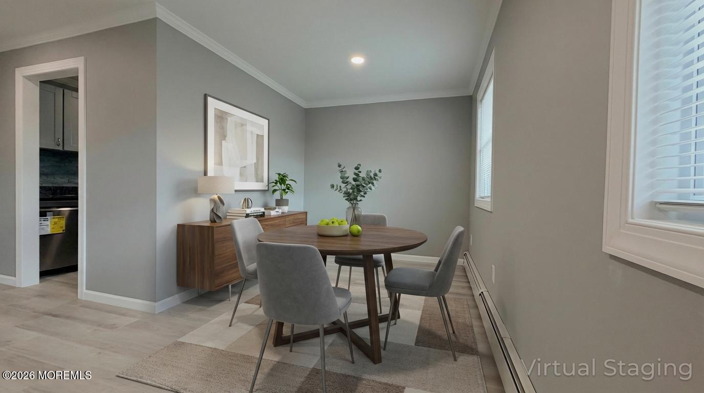 420 Cross Road, Unit B16 Matawan, NJ 07747 - Photo 33 of 36 a view of a dining room with furniture and window