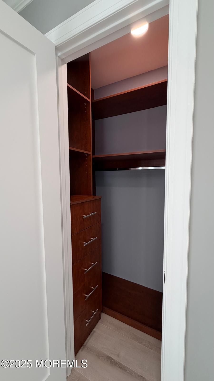 420 Cross Road, Unit B16 Matawan, NJ 07747 - Photo 5 of 36 a view of walk in closet