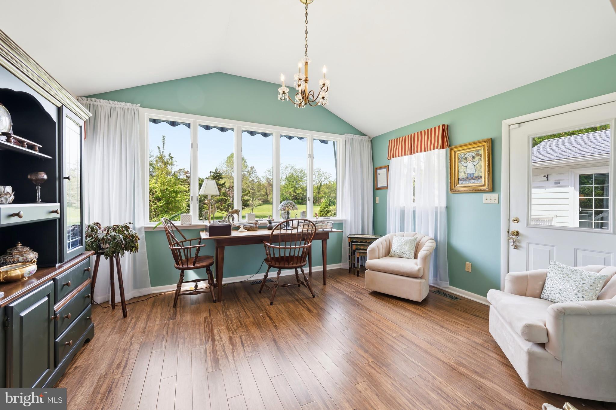 24561 Deepwater Point Drive St. Michaels, MD 21663 - Photo 22 of 50 a living room with furniture and a wooden floor