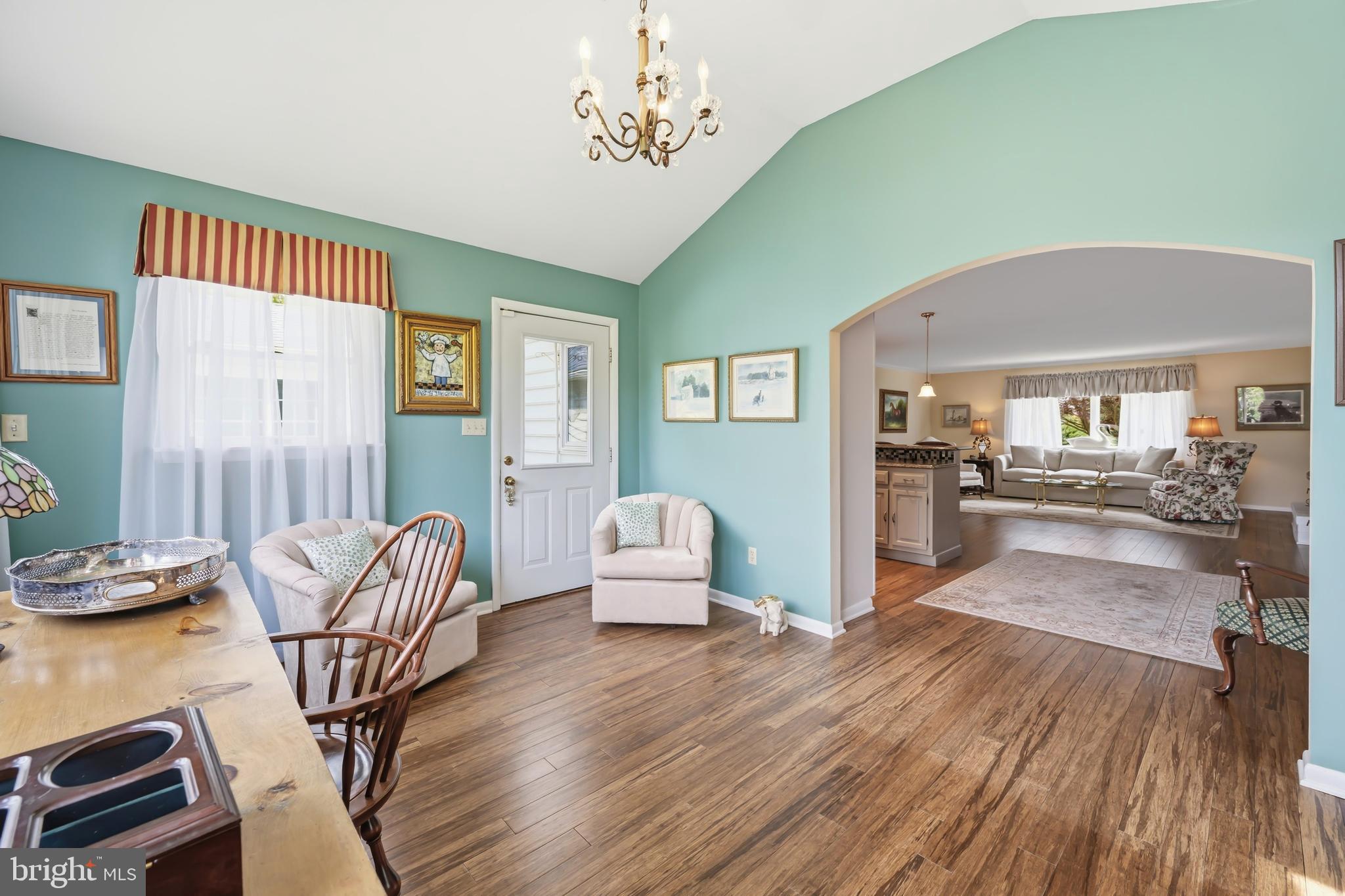 24561 Deepwater Point Drive St. Michaels, MD 21663 - Photo 23 of 50 a living room with furniture and a wooden floor