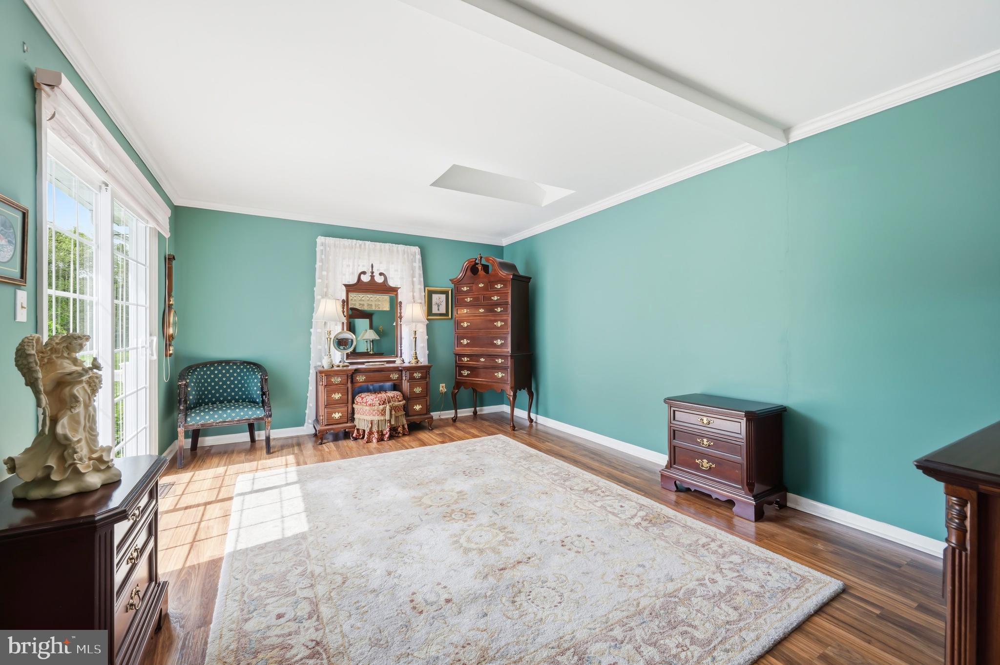 24561 Deepwater Point Drive St. Michaels, MD 21663 - Photo 29 of 50 a bedroom with furniture and a large window