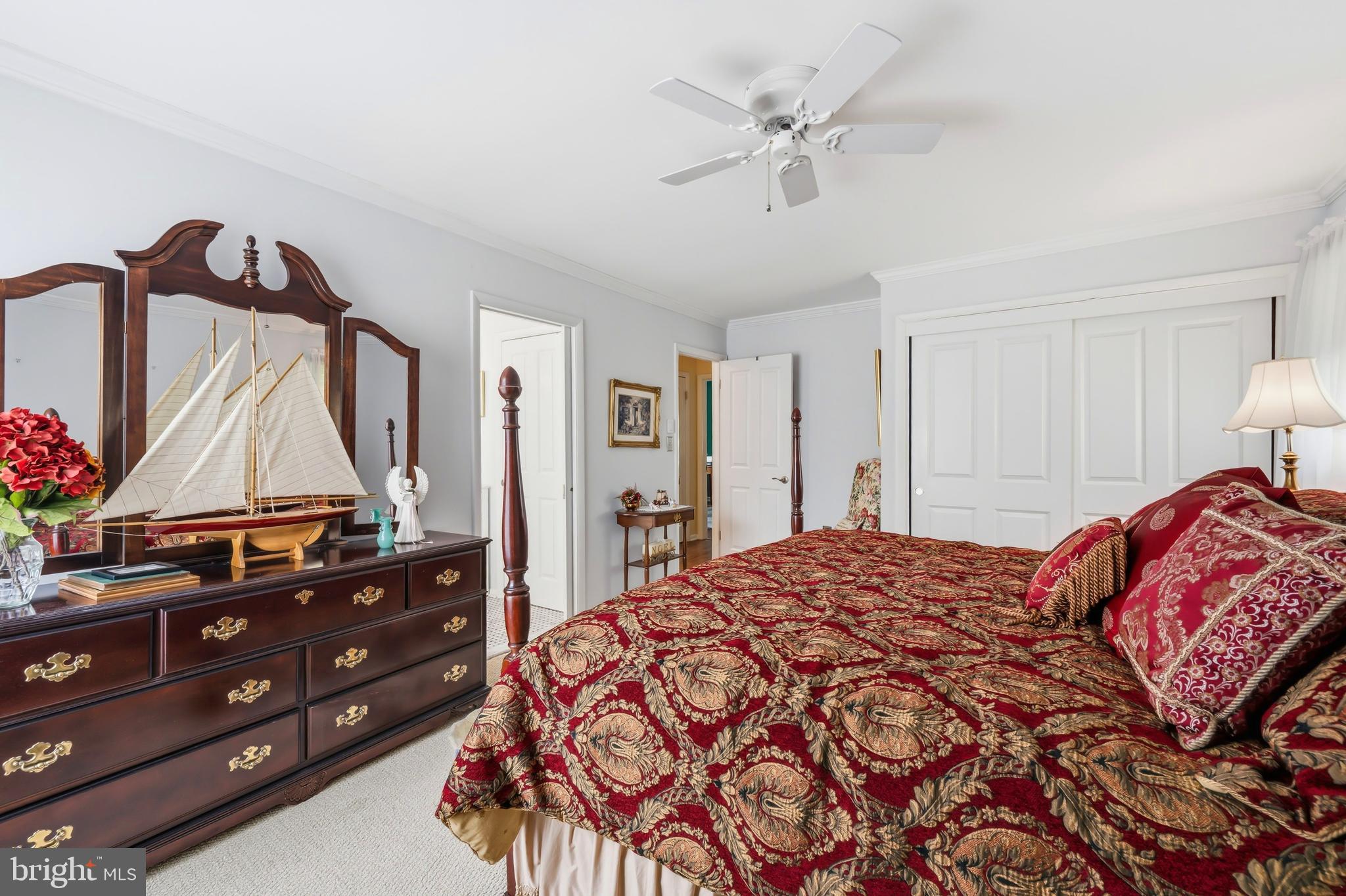 24561 Deepwater Point Drive St. Michaels, MD 21663 - Photo 32 of 50 a bed room with a bed and a closet