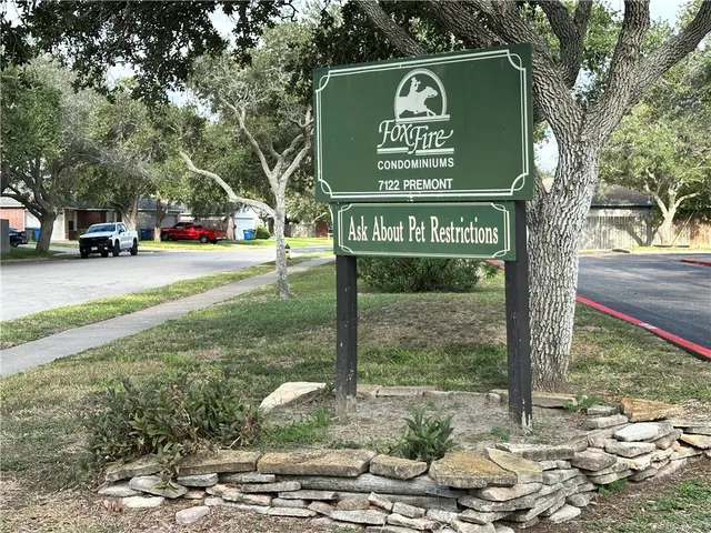 a sign on the side of the road