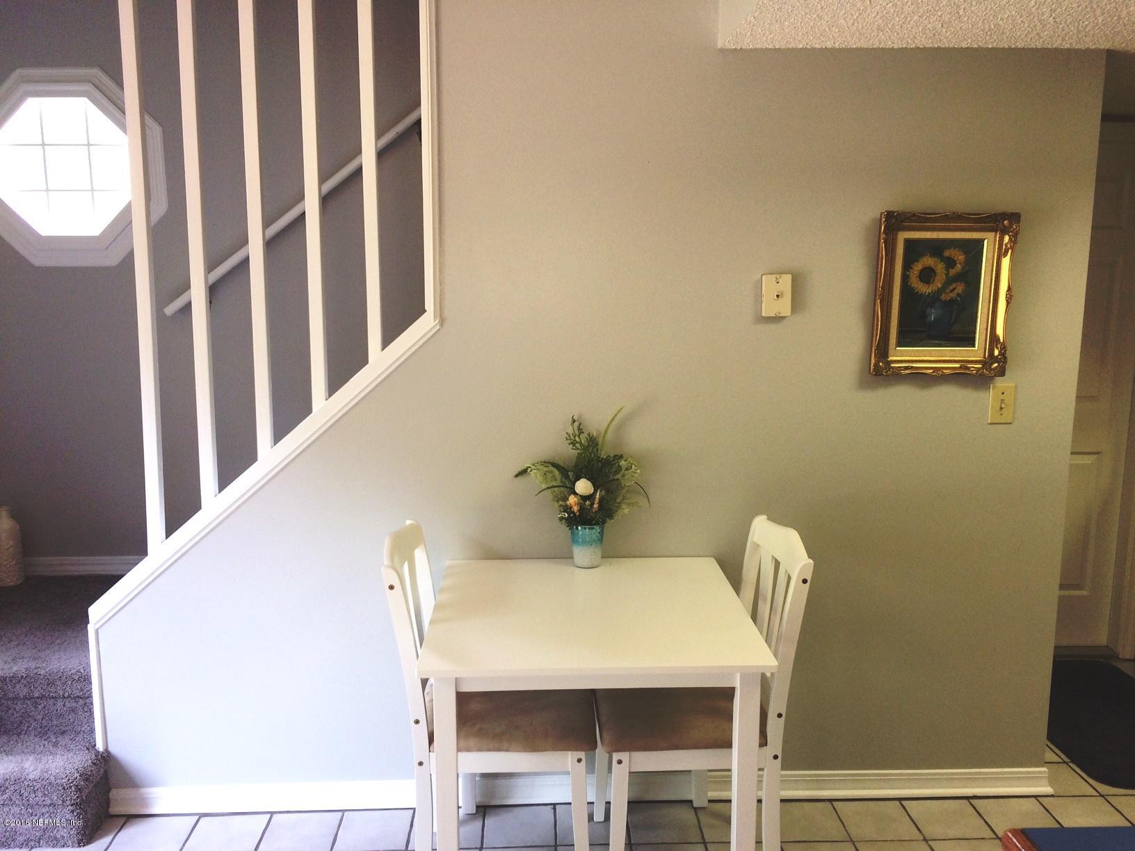 1112 Cactus Cut Road Middleburg, FL 32068 - Photo 13 of 48 a view of a dining room with furniture