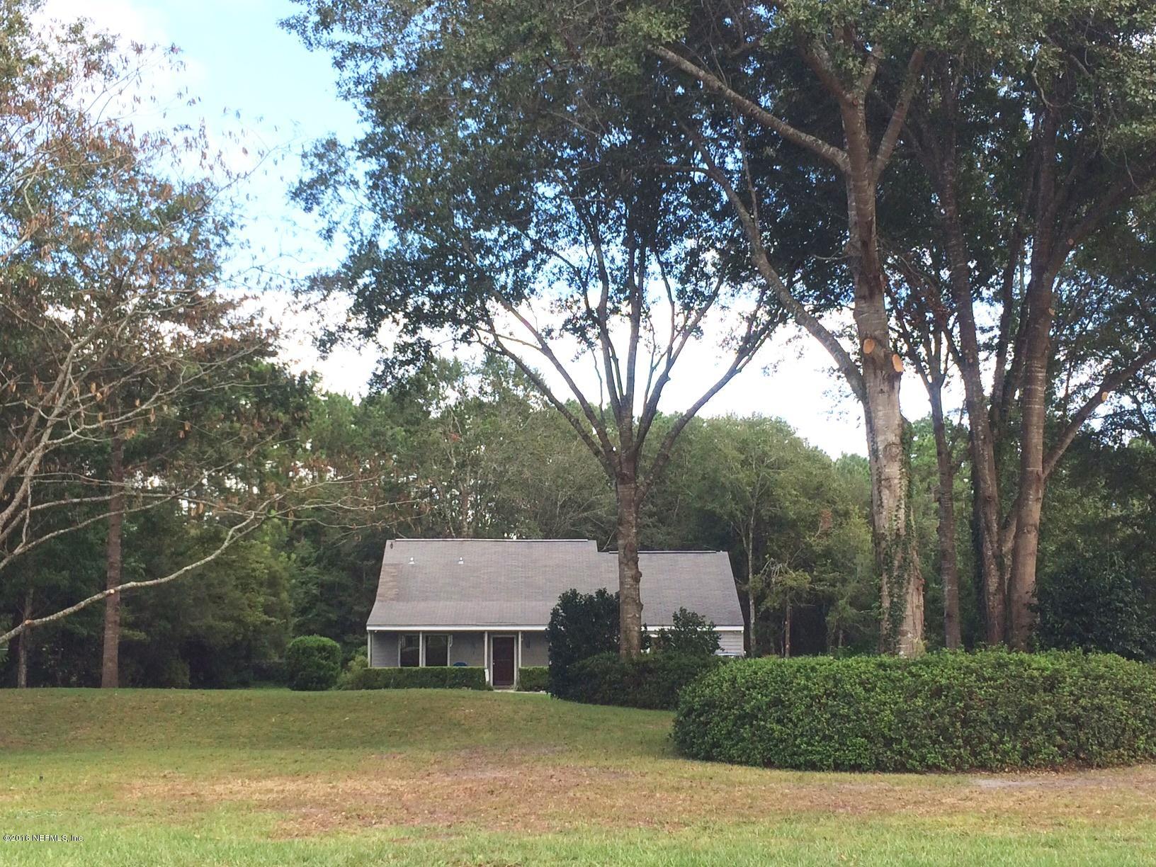 1112 Cactus Cut Road Middleburg, FL 32068 - Photo 2 of 48 a view of a house with a yard