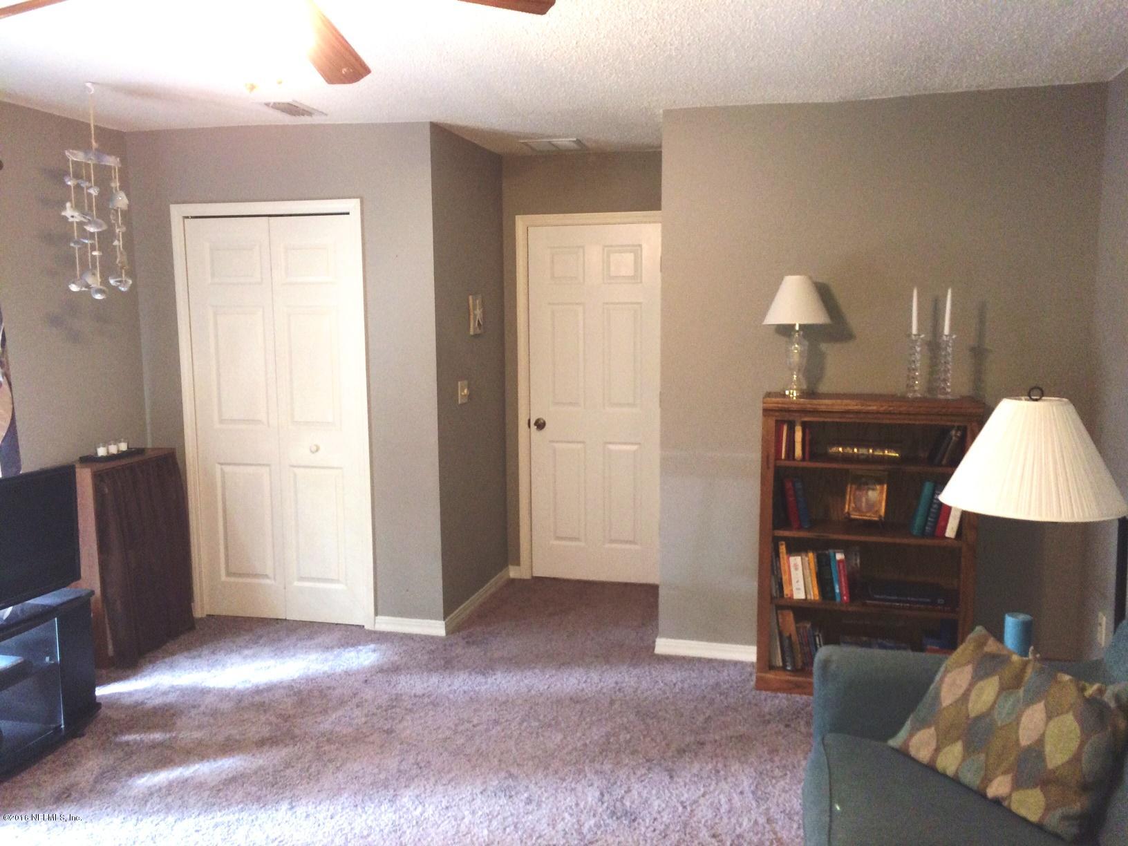 1112 Cactus Cut Road Middleburg, FL 32068 - Photo 21 of 48 a view of livingroom with furniture and lamp