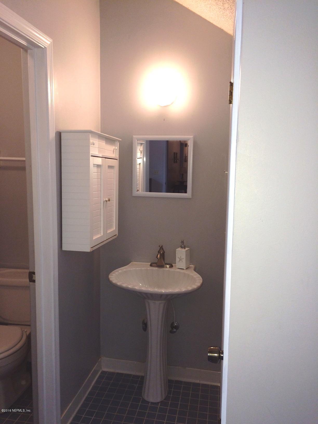 1112 Cactus Cut Road Middleburg, FL 32068 - Photo 23 of 48 a bathroom with a sink and a toilet