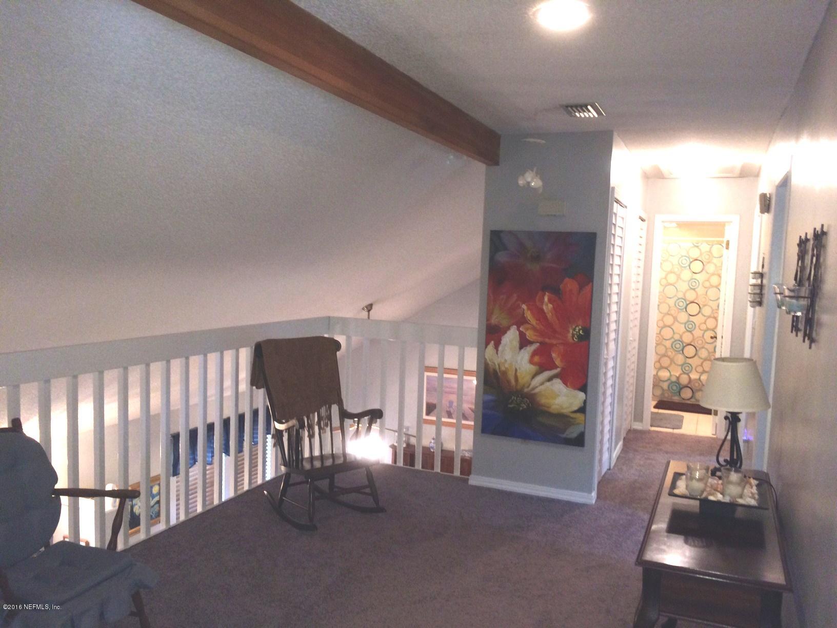 1112 Cactus Cut Road Middleburg, FL 32068 - Photo 28 of 48 a living room with furniture and floor to ceiling window