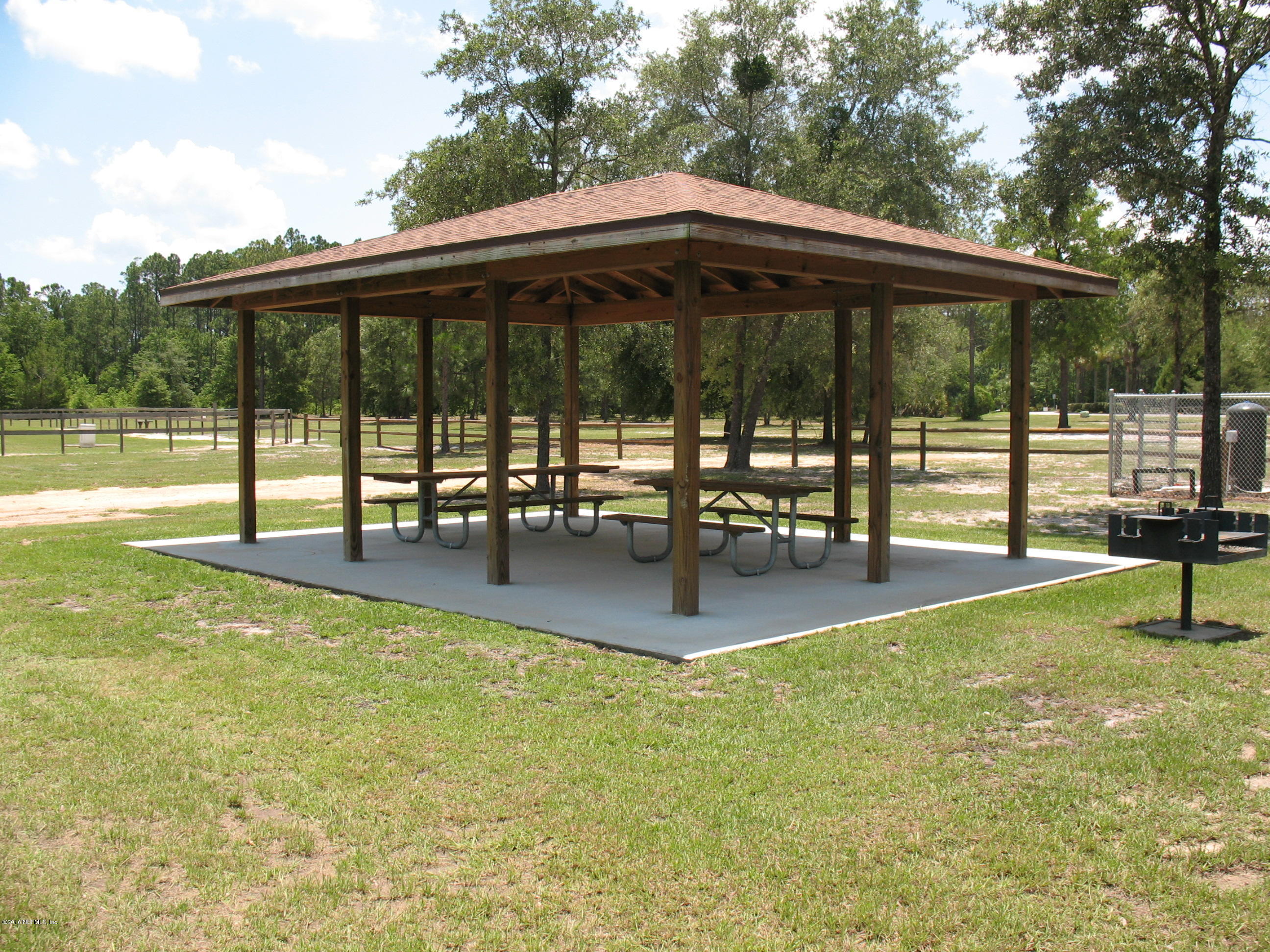 1112 Cactus Cut Road Middleburg, FL 32068 - Photo 48 of 48 swimming pool view with a garden space