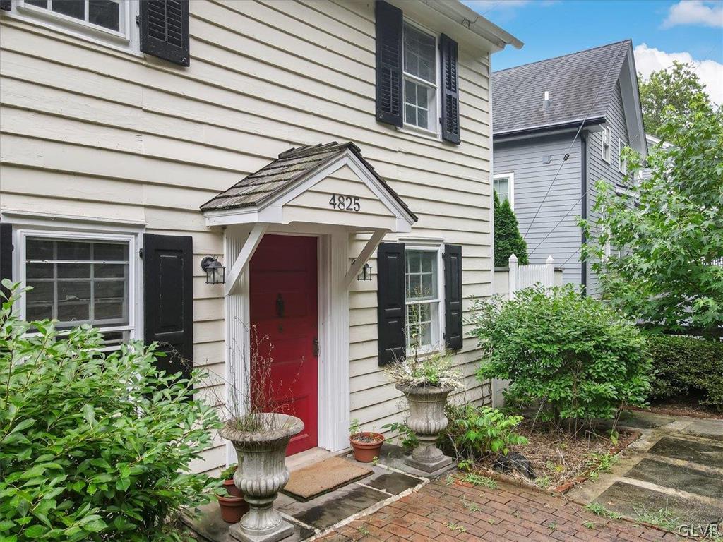 4825 River Road New Hope, PA 18938 - Photo 3 of 50 a front view of a house with garden