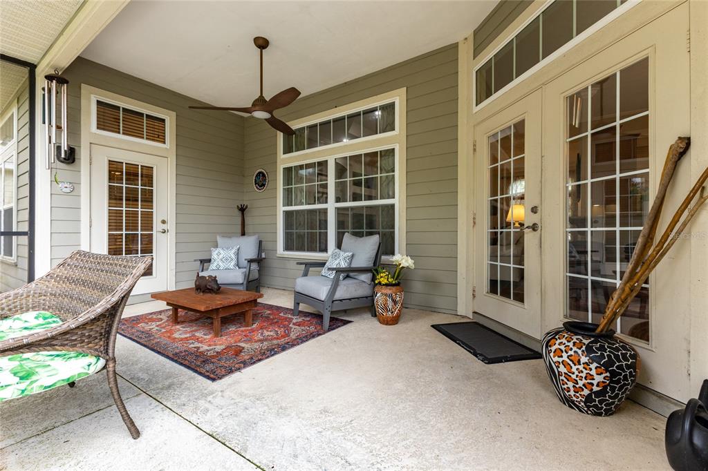 3573 Southwest 72nd Way Gainesville, FL 32608 - Photo 32 of 41 Fully Screened in Back Porch with access to main living and primary bedroom
