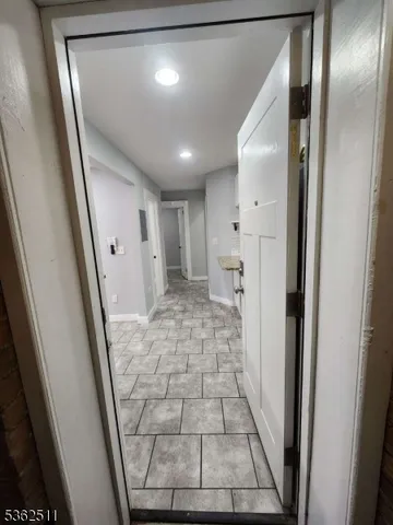 a bathroom with a shower and toilet