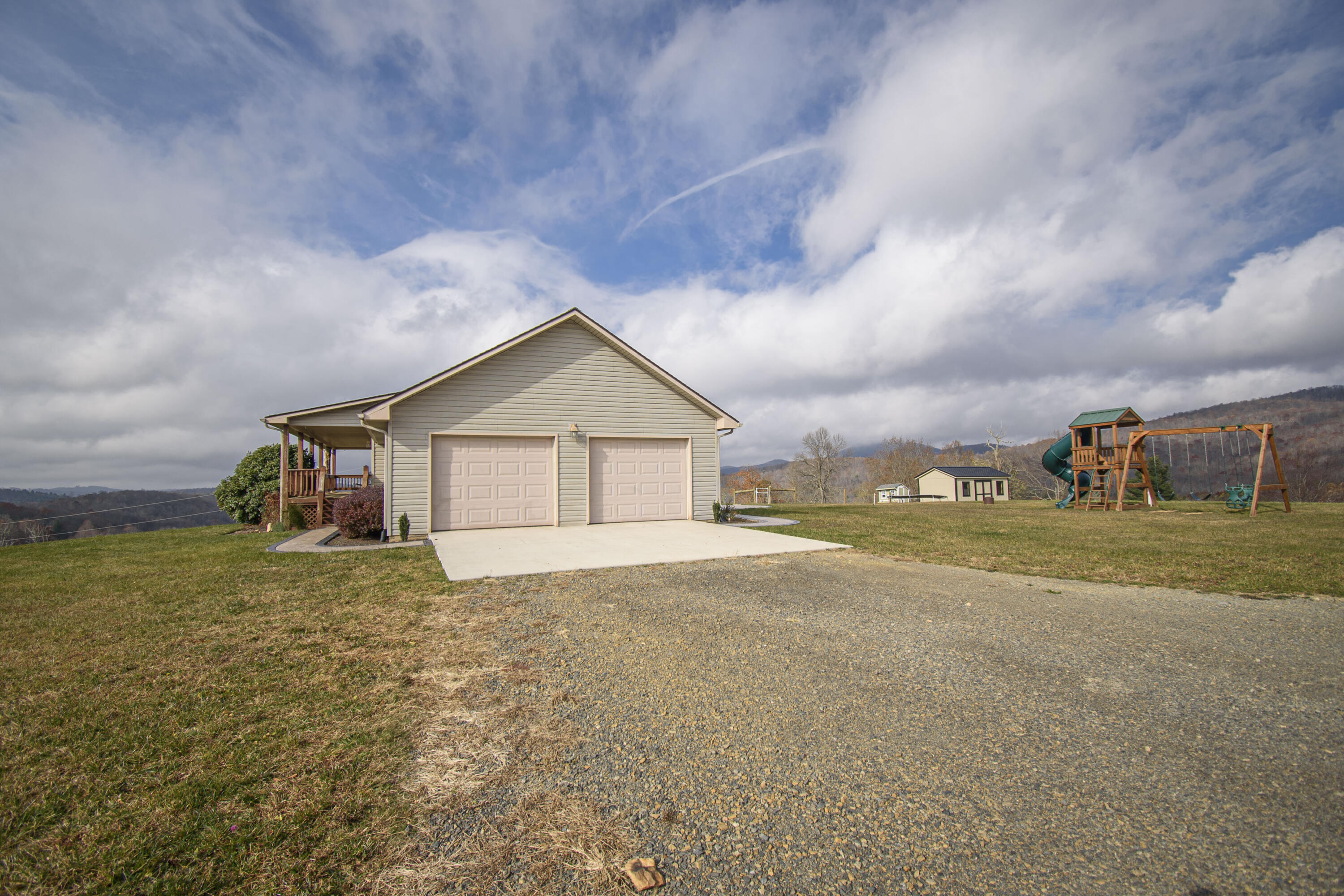 5485 Buffalo Mountain Road Southwest Willis, VA 24380 - Photo 15 of 77 a view of a house with a yard