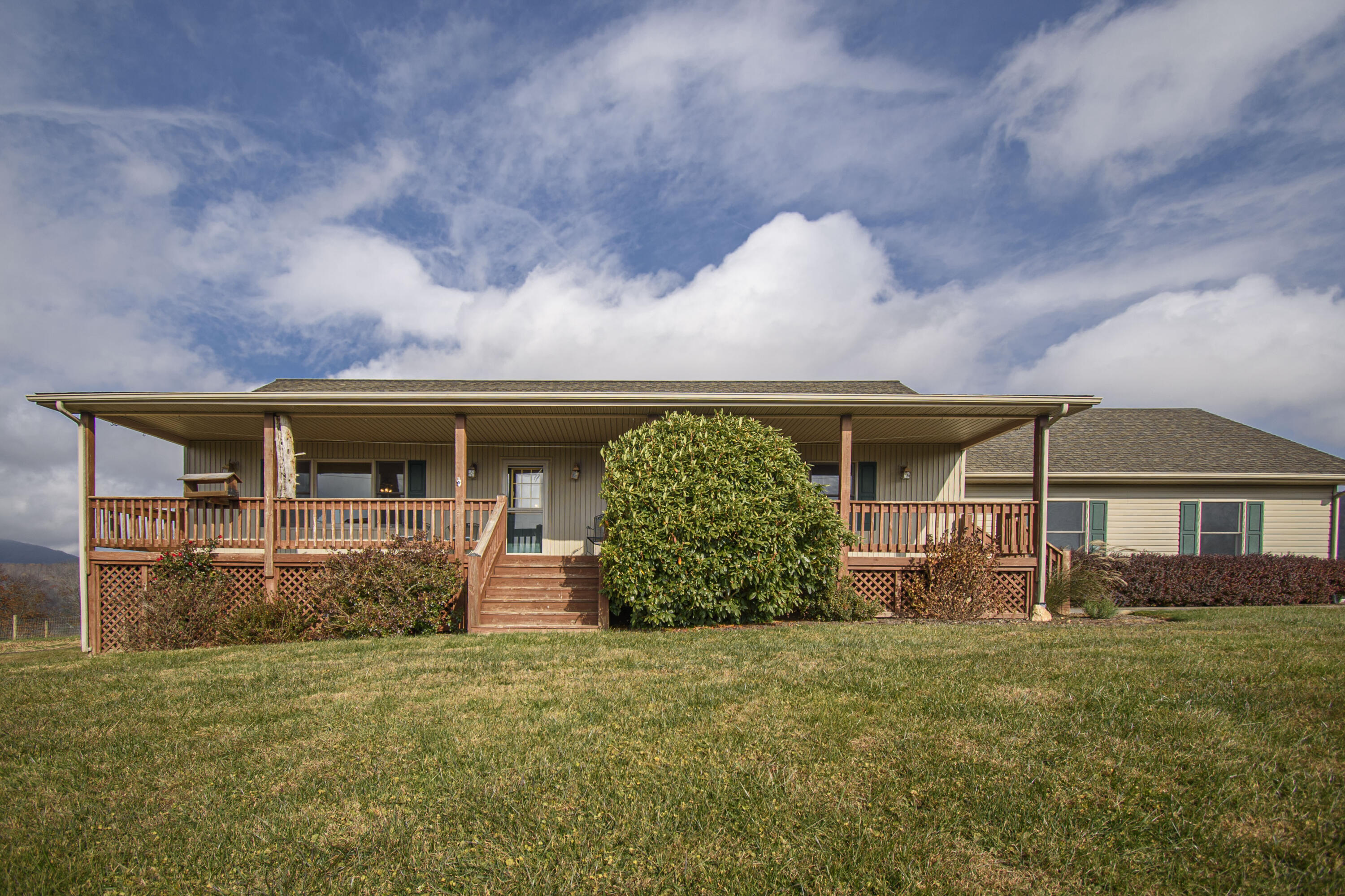 5485 Buffalo Mountain Road Southwest Willis, VA 24380 - Photo 2 of 77 front view of a house with a big yard