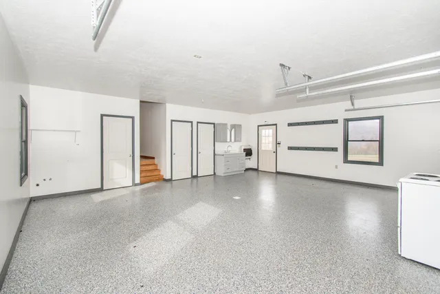 a view of lake with green field