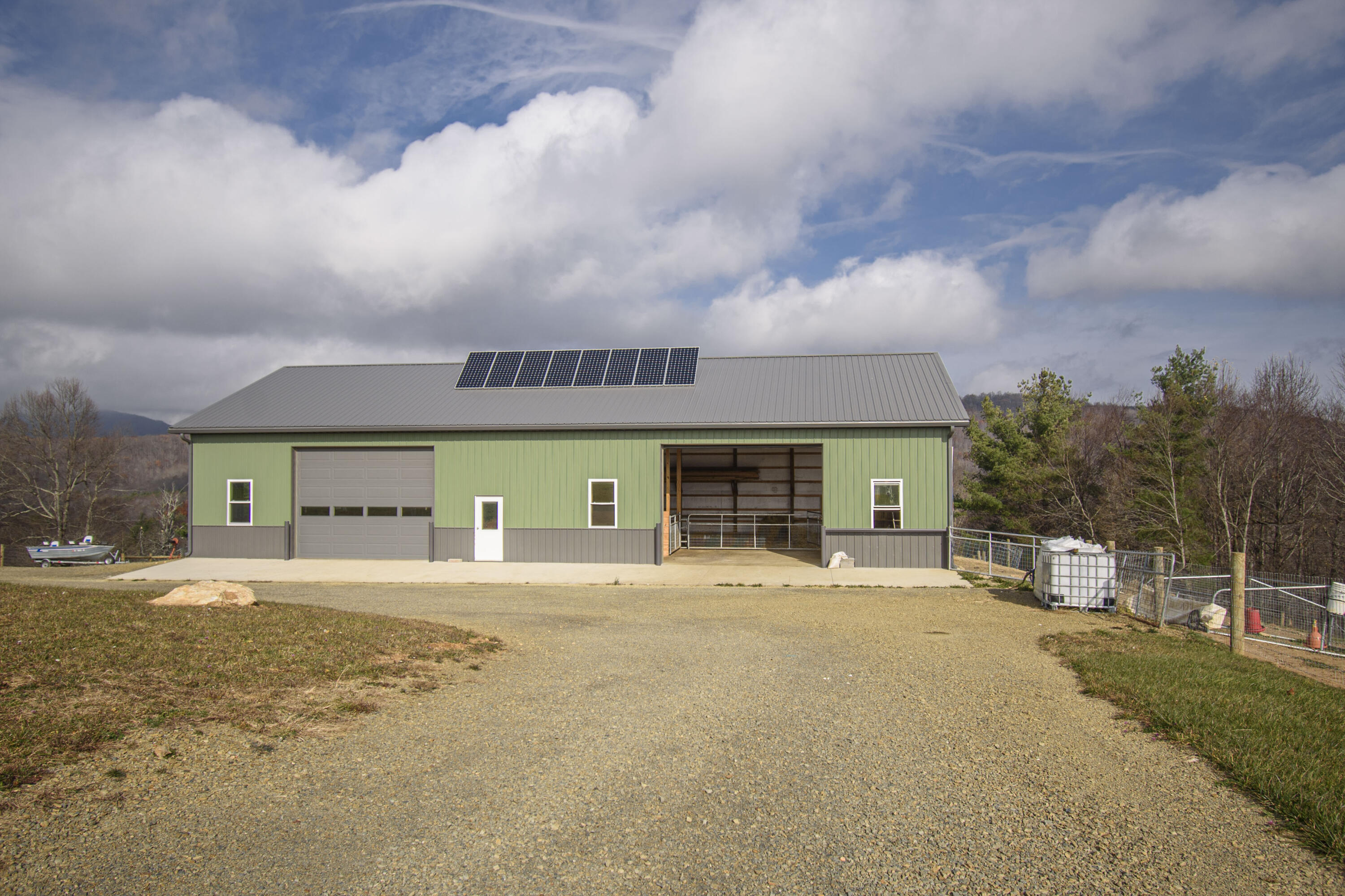 5485 Buffalo Mountain Road Southwest Willis, VA 24380 - Photo 46 of 77 a house view with a sitting space and garden