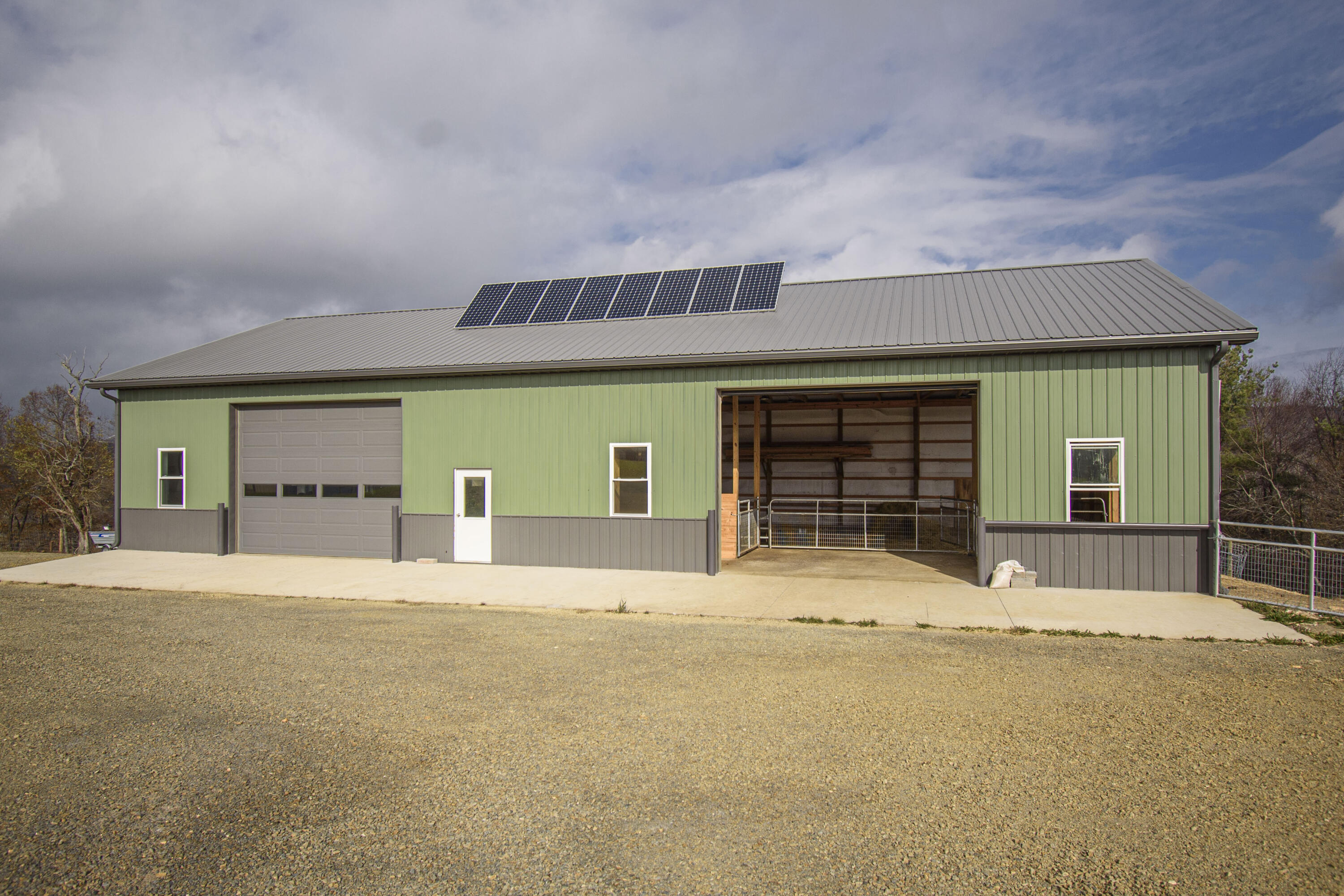 5485 Buffalo Mountain Road Southwest Willis, VA 24380 - Photo 48 of 77 a front view of a house with a outdoor space and window