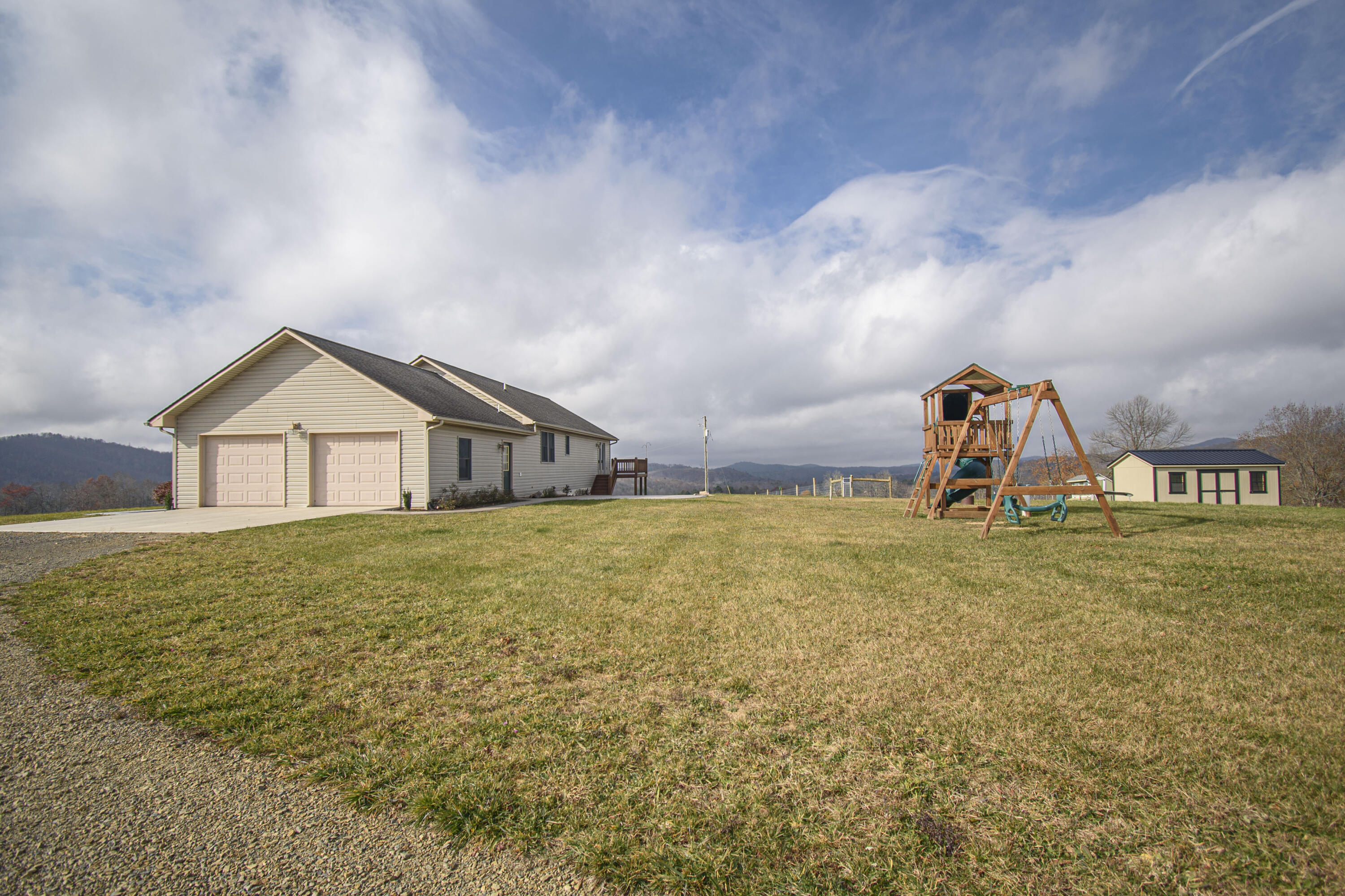 5485 Buffalo Mountain Road Southwest Willis, VA 24380 - Photo 6 of 77 a bathroom with a sink and a yard
