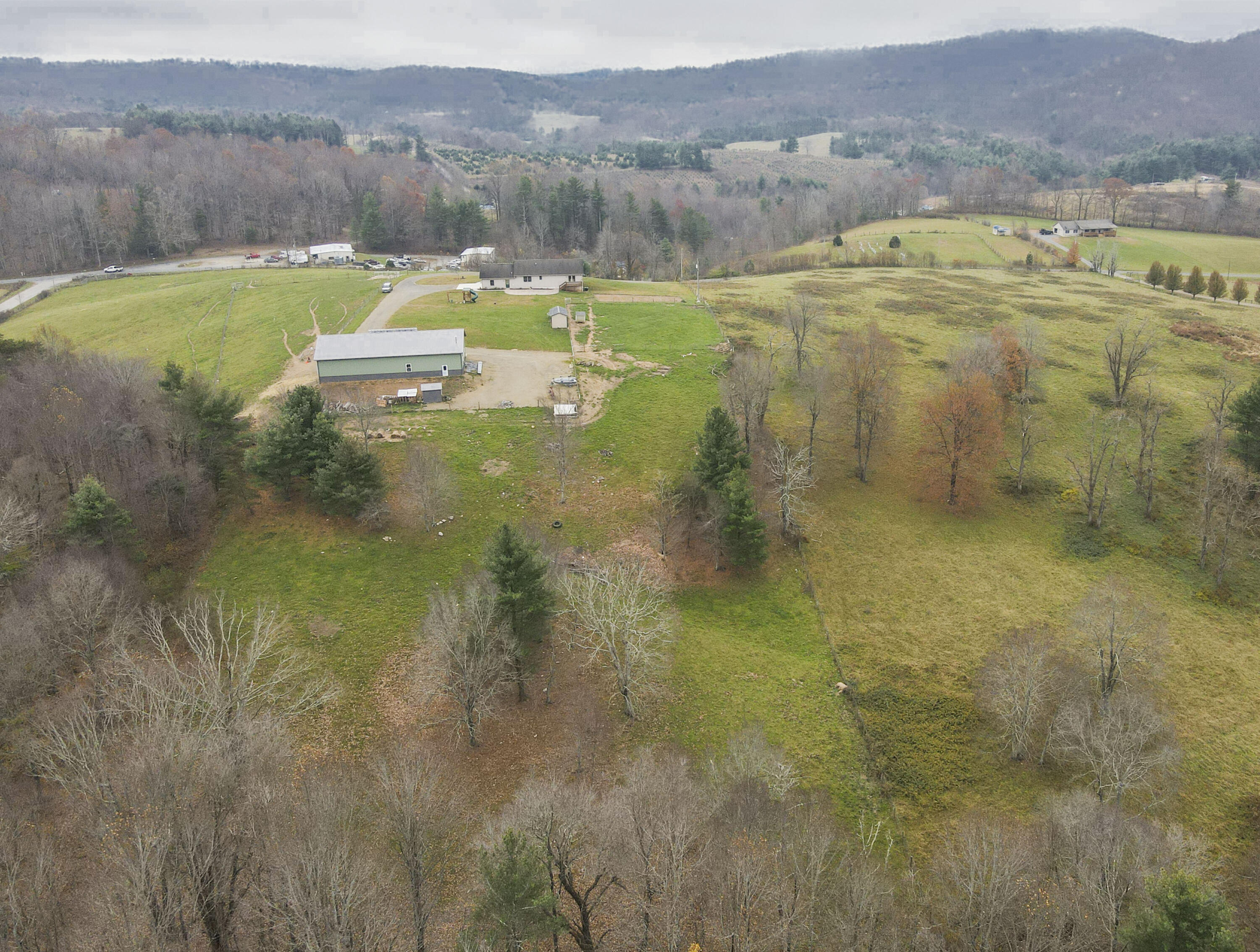 5485 Buffalo Mountain Road Southwest Willis, VA 24380 - Photo 69 of 77 a view of a lake with a mountain