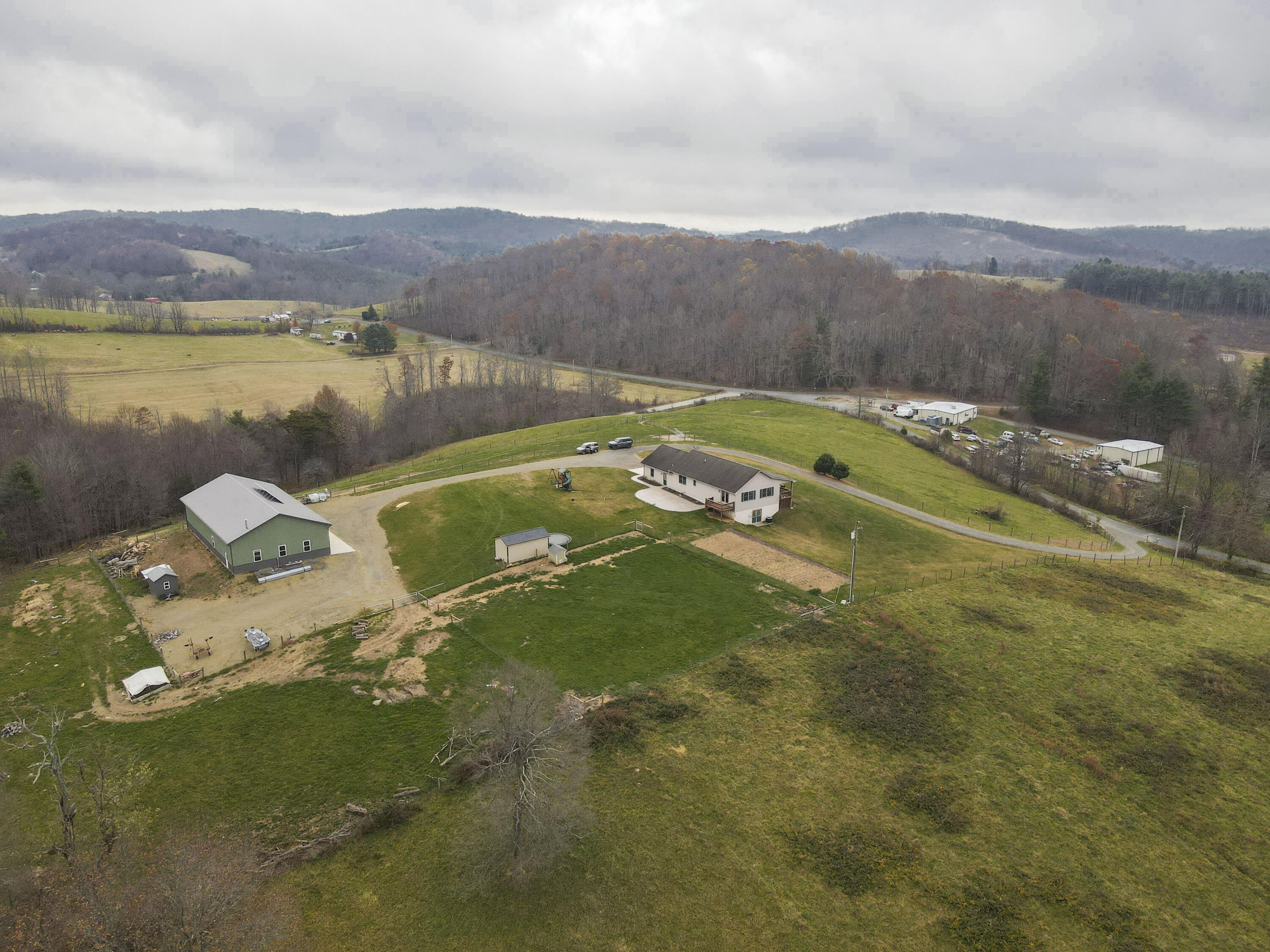 5485 Buffalo Mountain Road Southwest Willis, VA 24380 - Photo 73 of 77 a view of a lush green hillside and houses