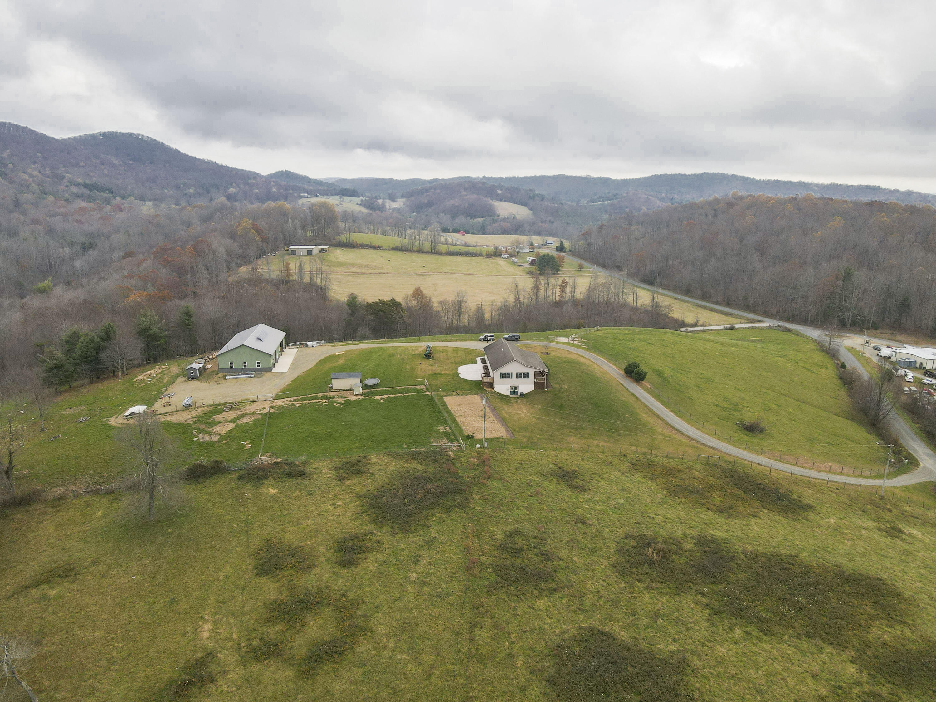 5485 Buffalo Mountain Road Southwest Willis, VA 24380 - Photo 74 of 77 a view of a lake with a mountain
